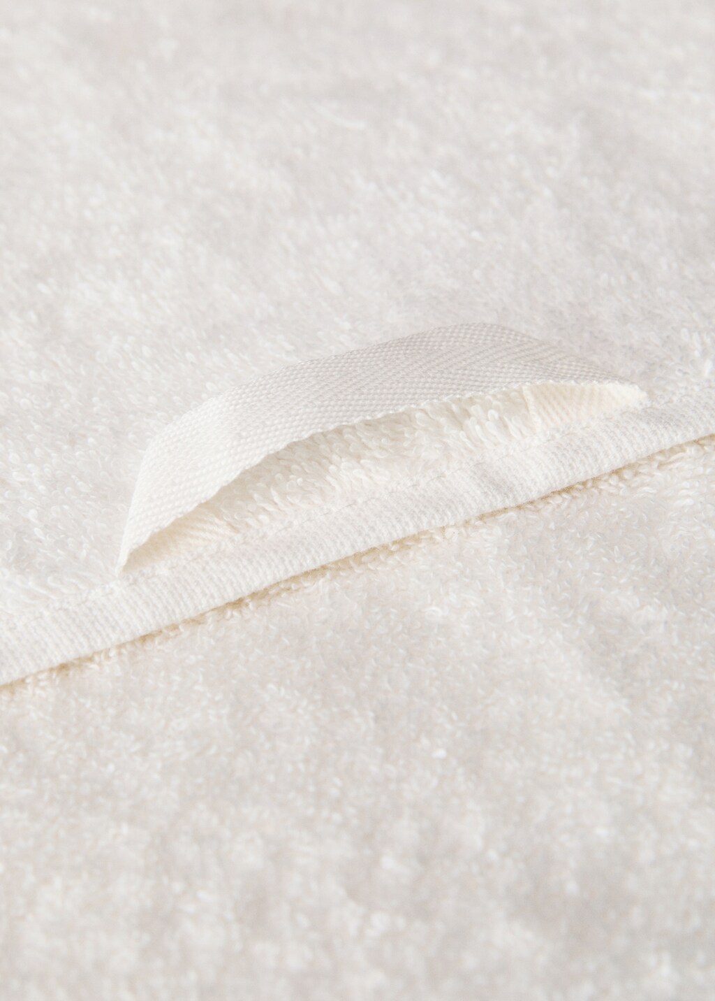 Contrasting pom-pom hand towel - White