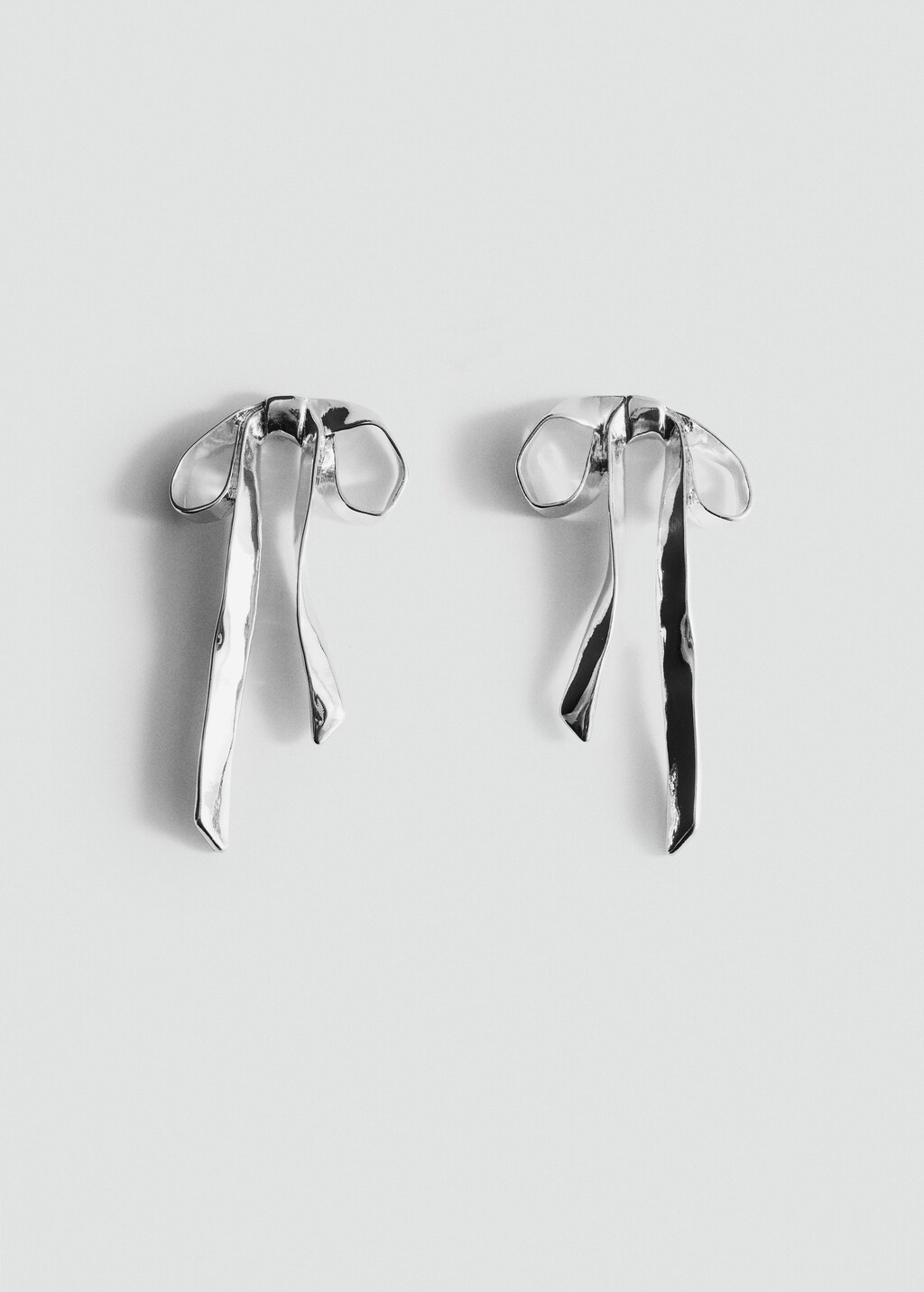 Rigid bow earrings - Silver