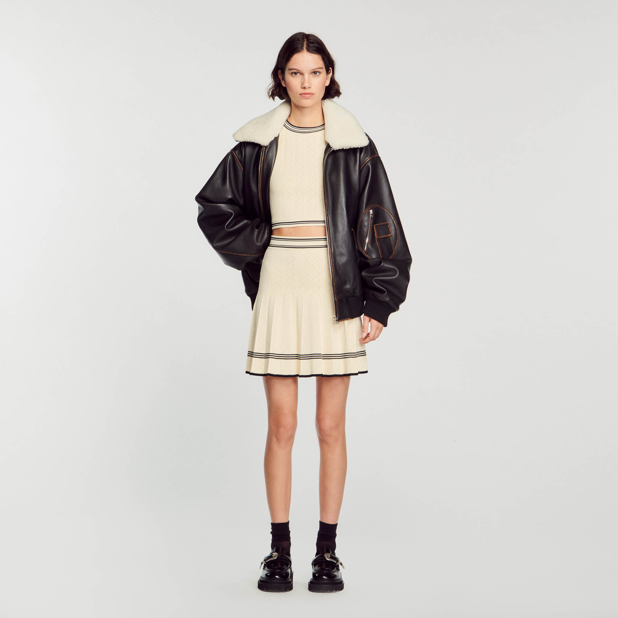 Short pleated knit skirt