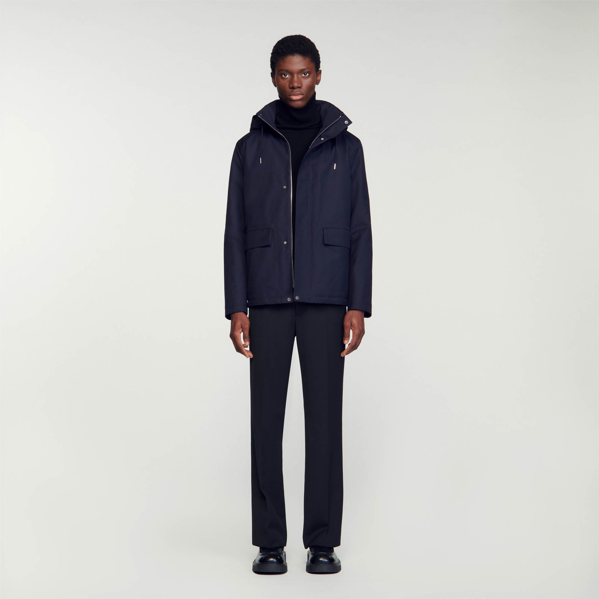 Technical hooded coat