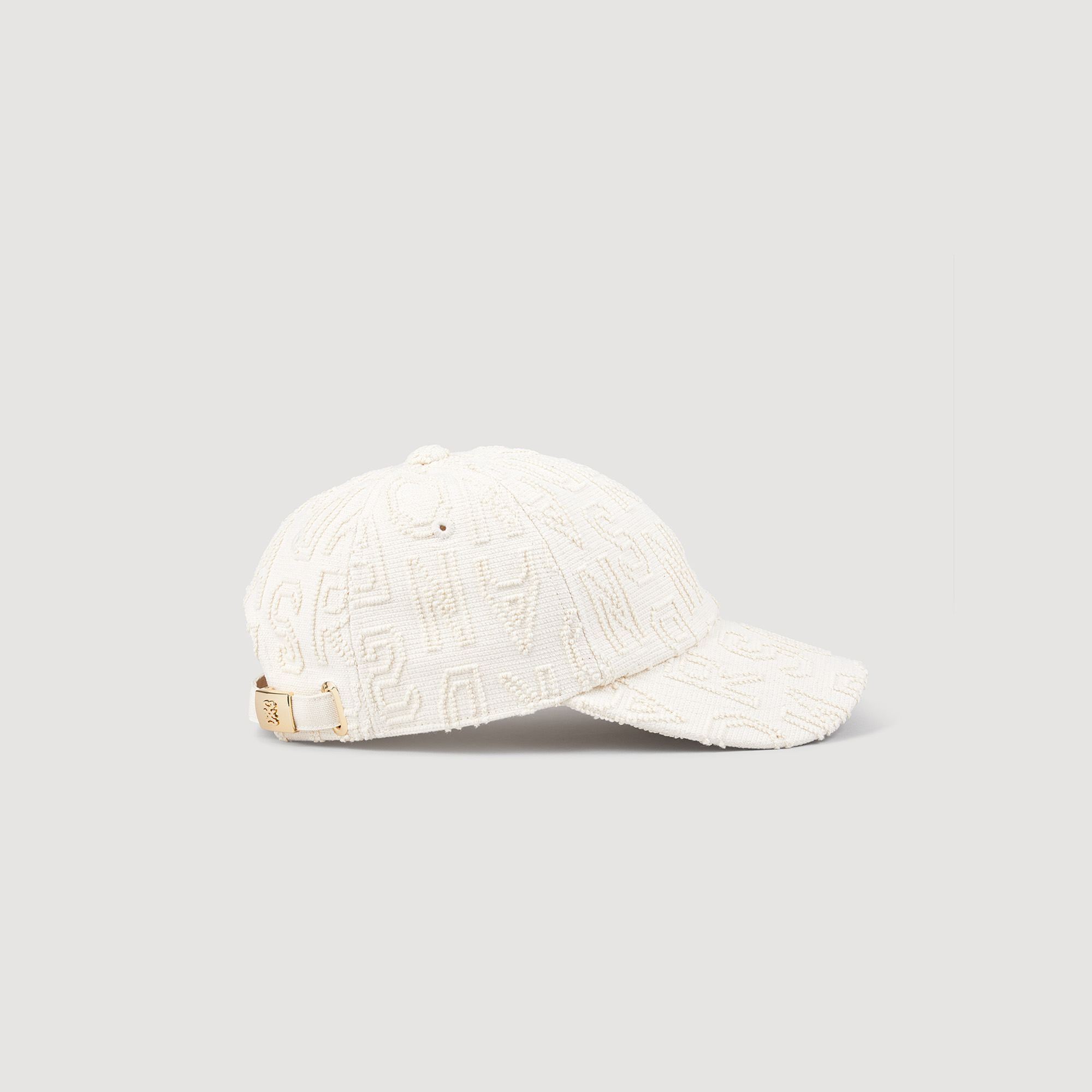 Cloth cap with embroidered letters