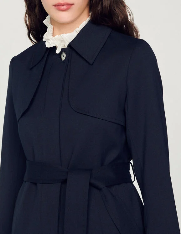 Trench coat with pleated inset