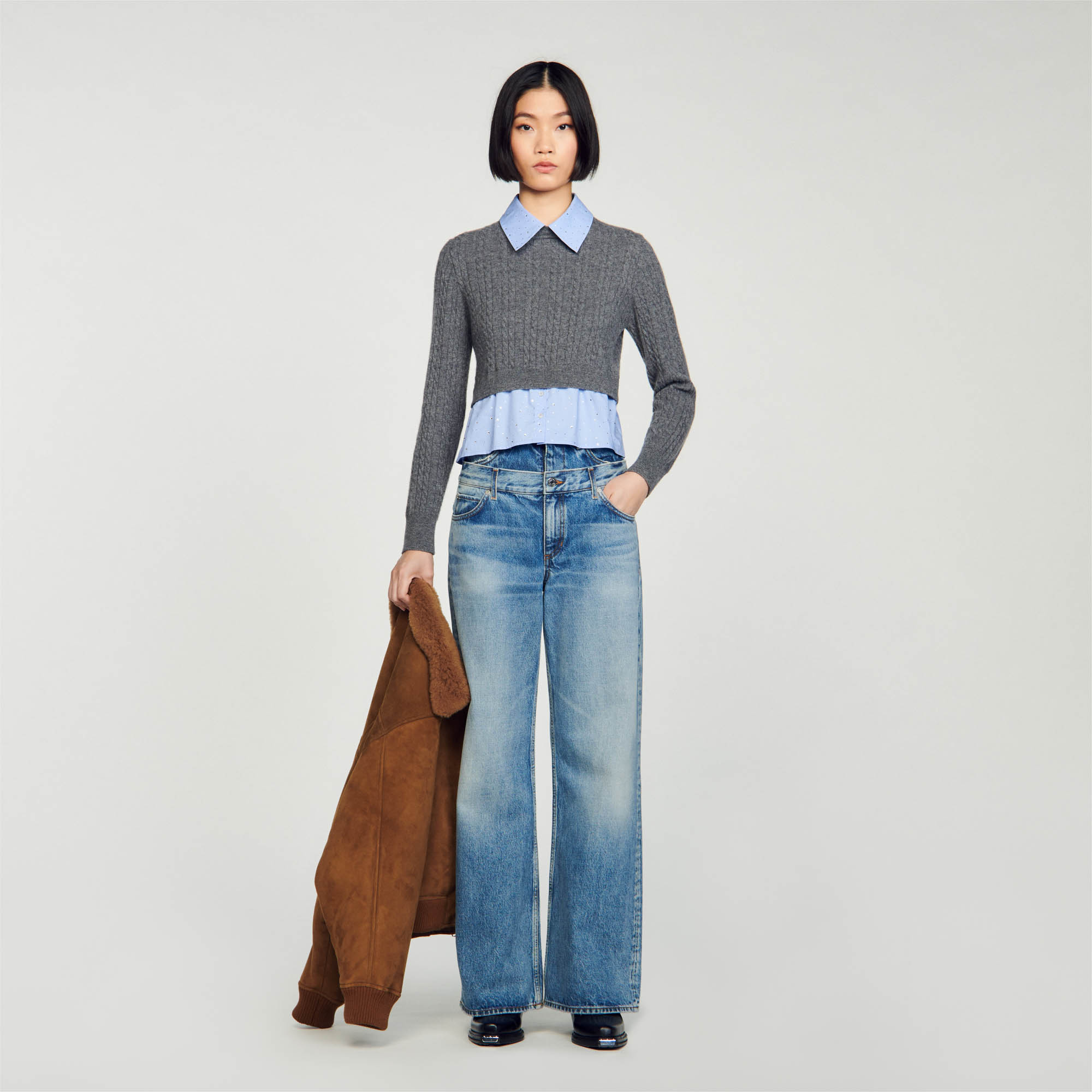 Cropped cable knit sweater