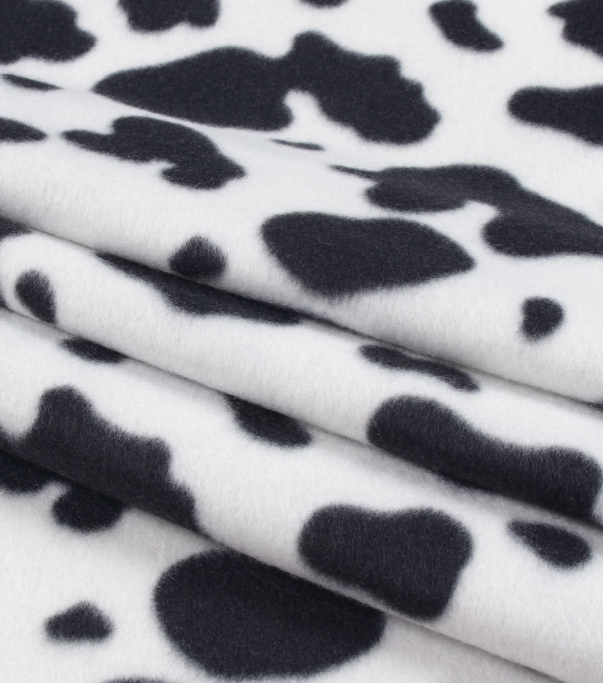 Cow Print Blizzard Fleece Fabric