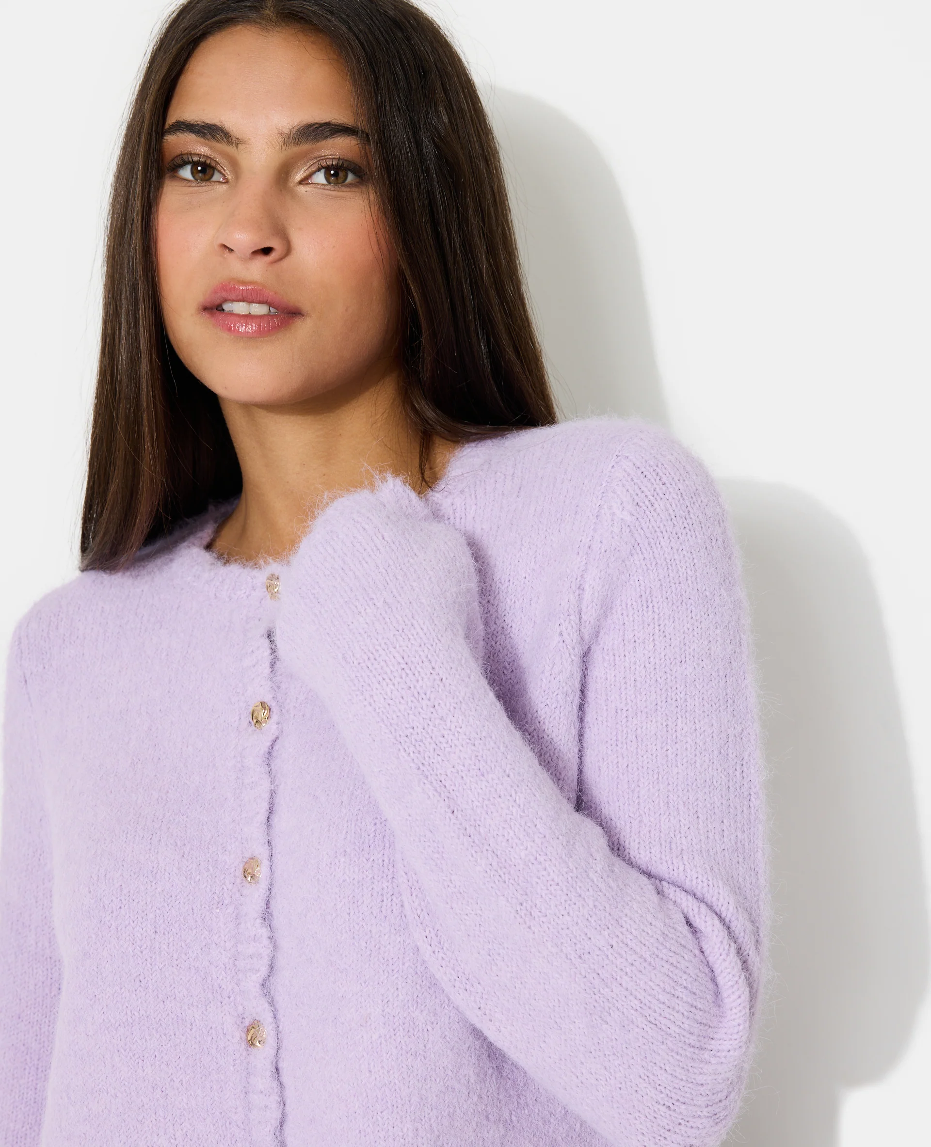 Gilet col rond avec boutons bijoux