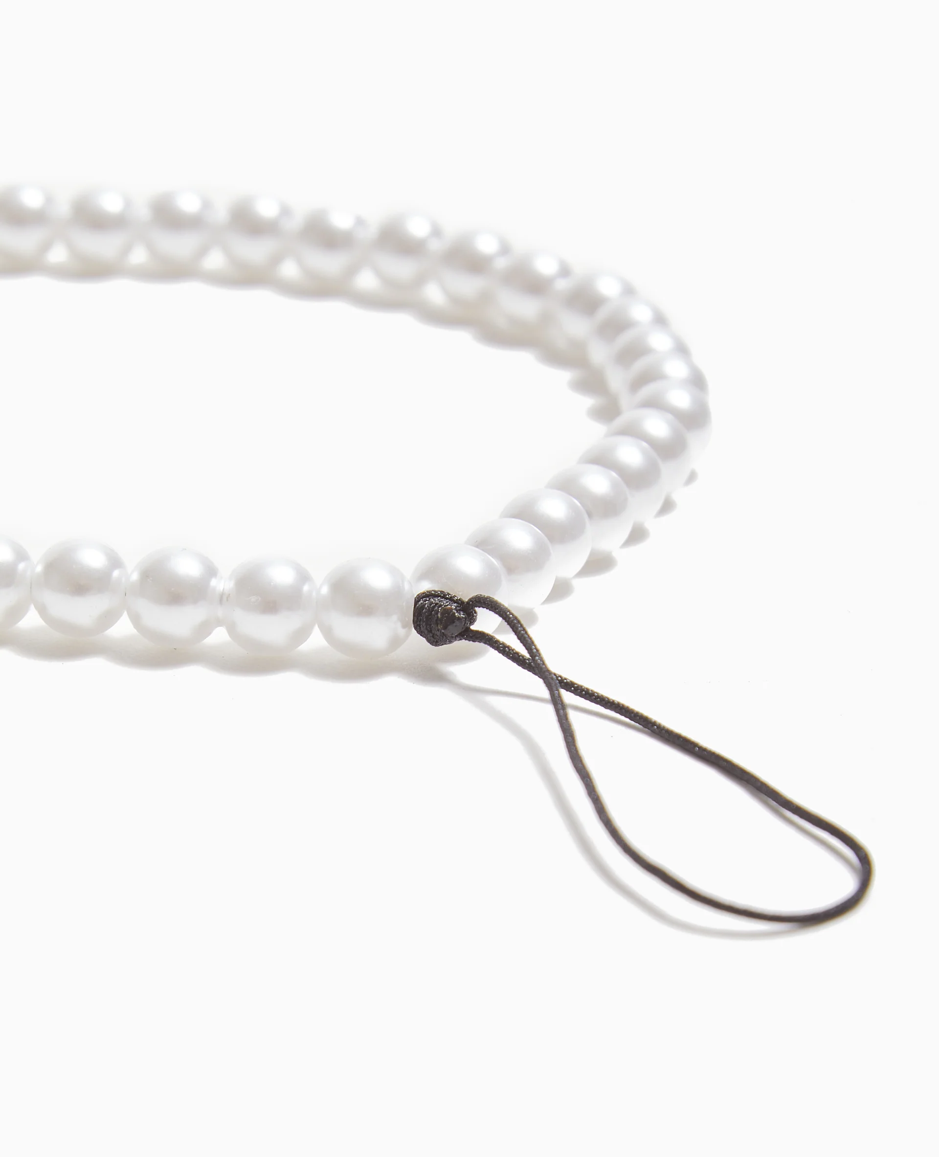 Dragonne de téléphone avec perles