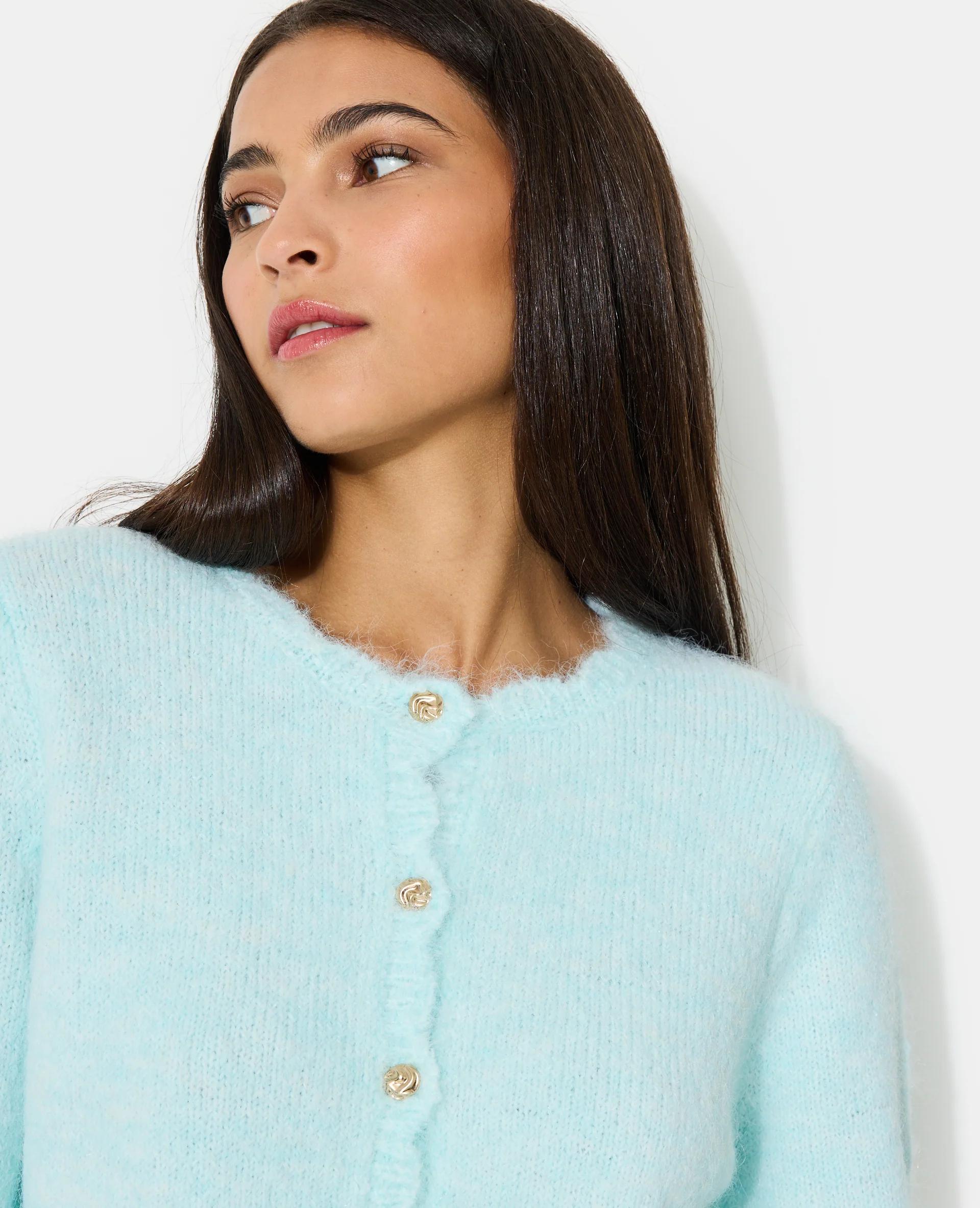 Gilet col rond avec boutons bijoux