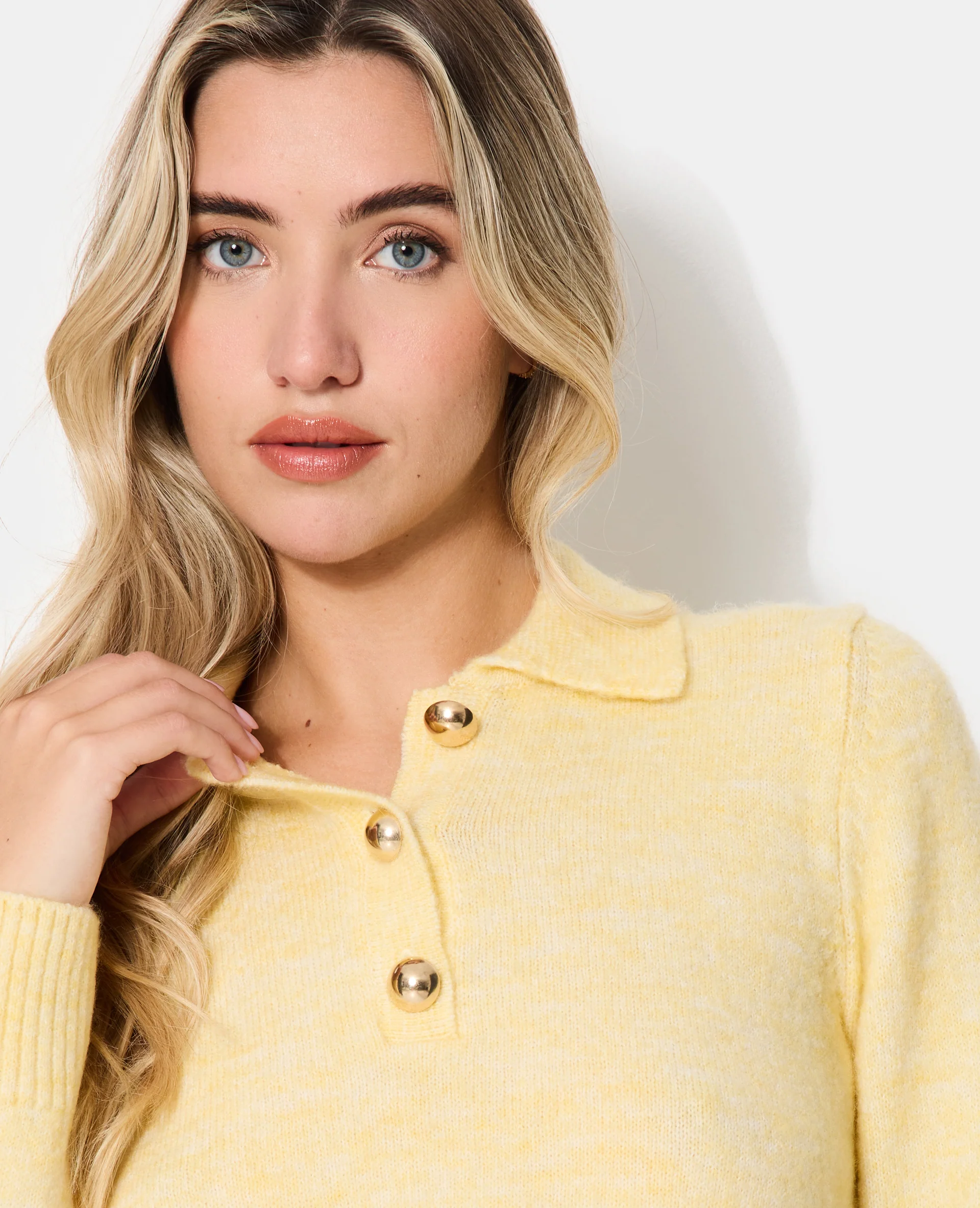 Pull col polo avec boutons métal