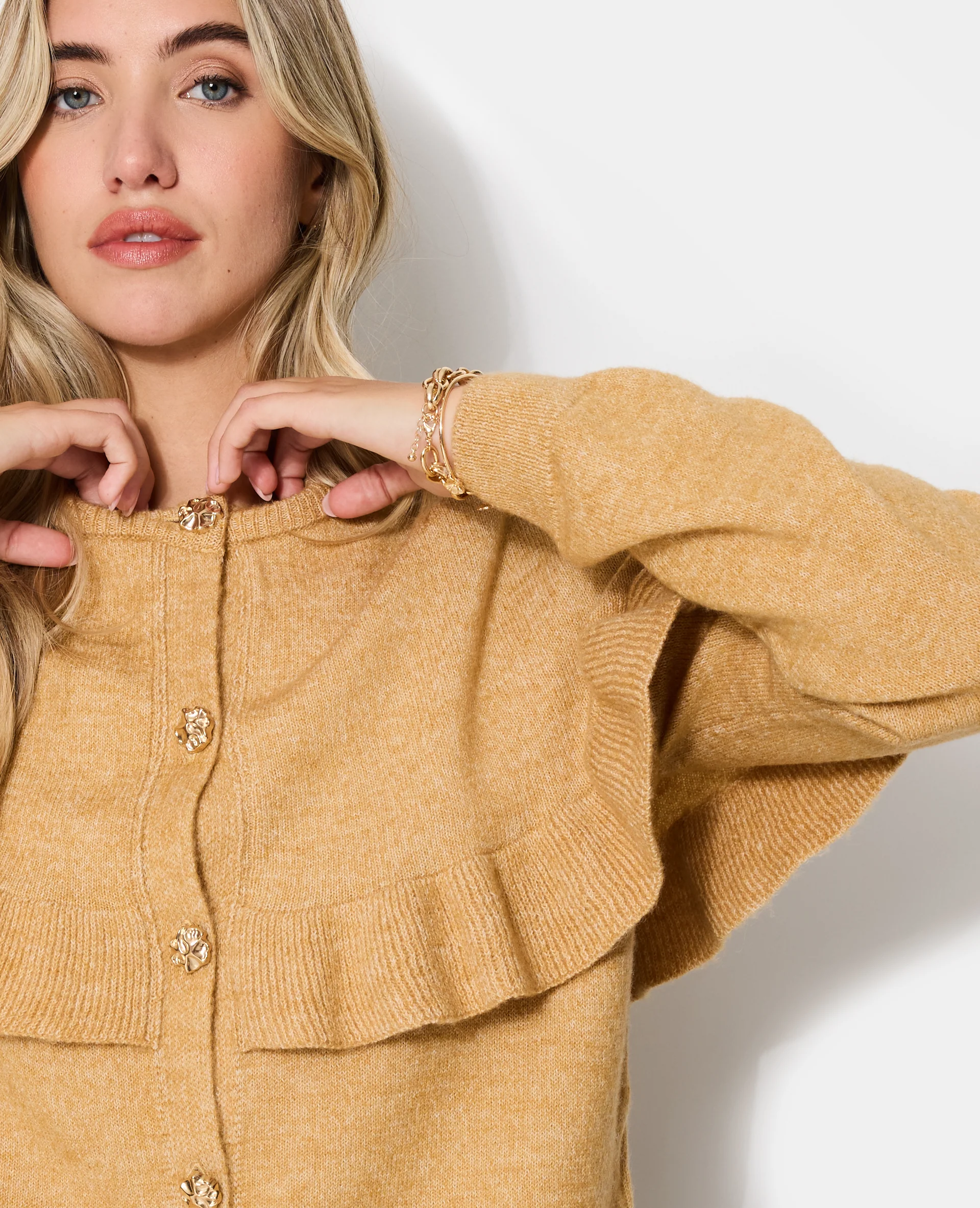 Gilet avec cape et boutons fantaisie