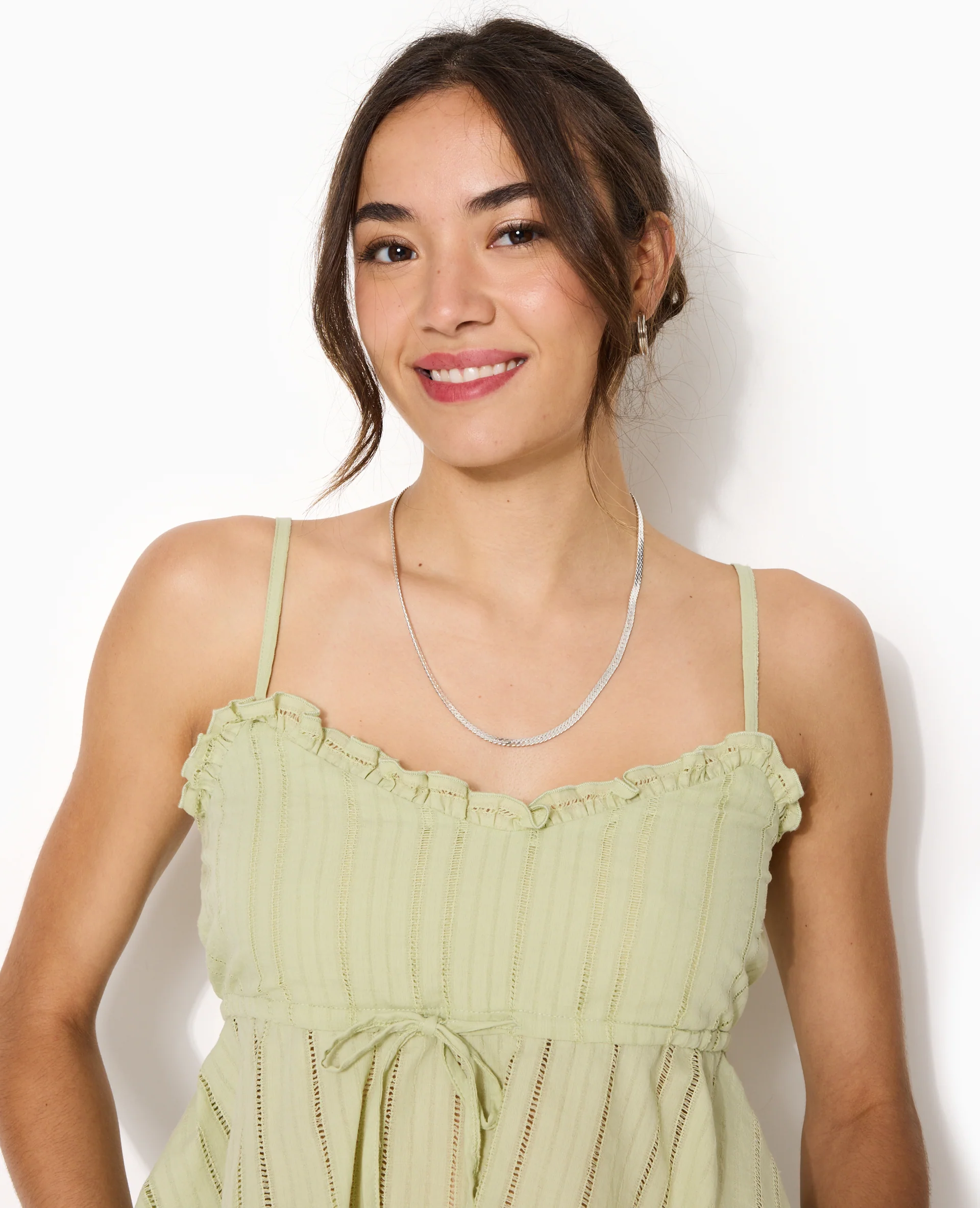 Top fines bretelles en tissu ajouré effet rayé