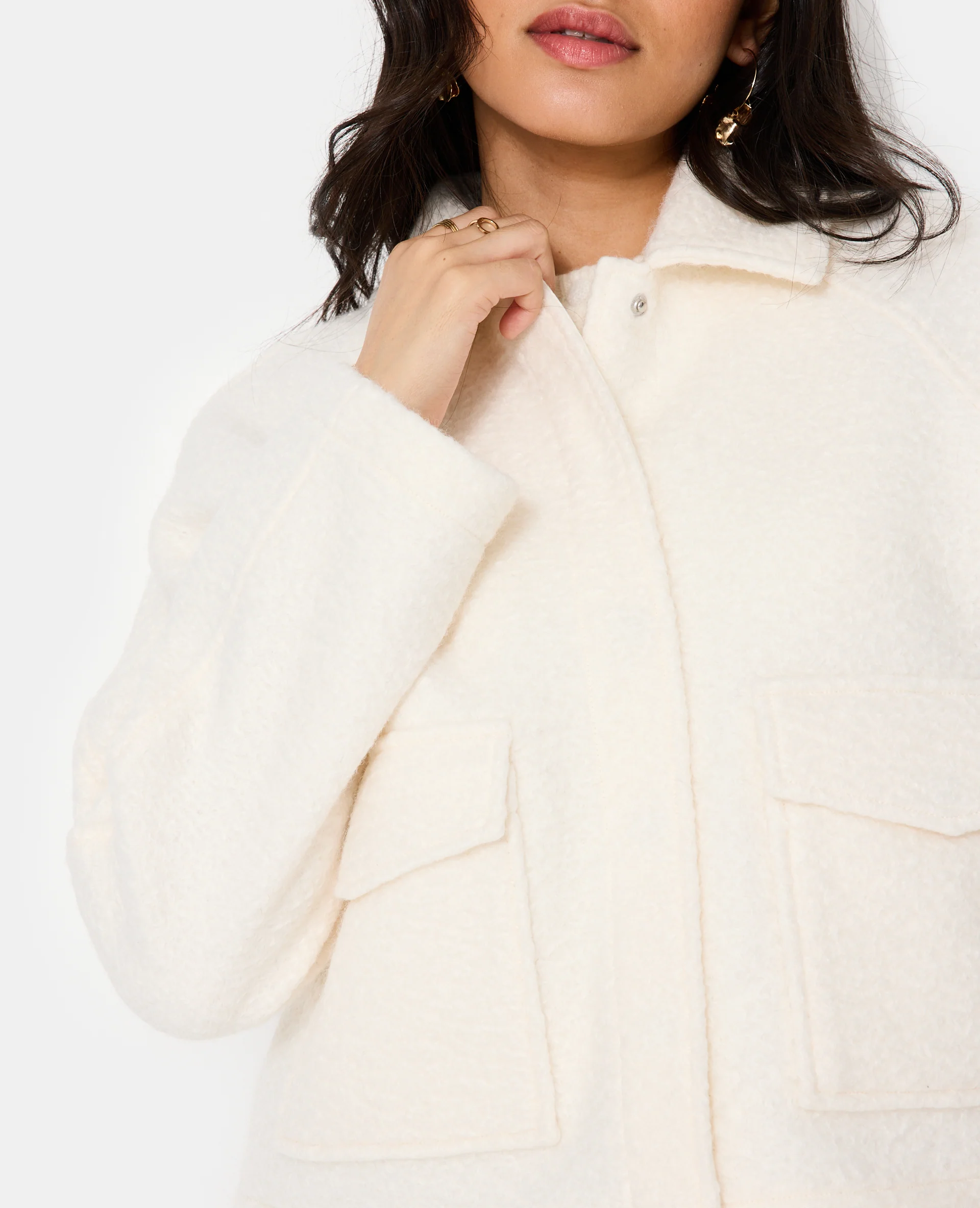 Blouson court effet drap de laine bouclée