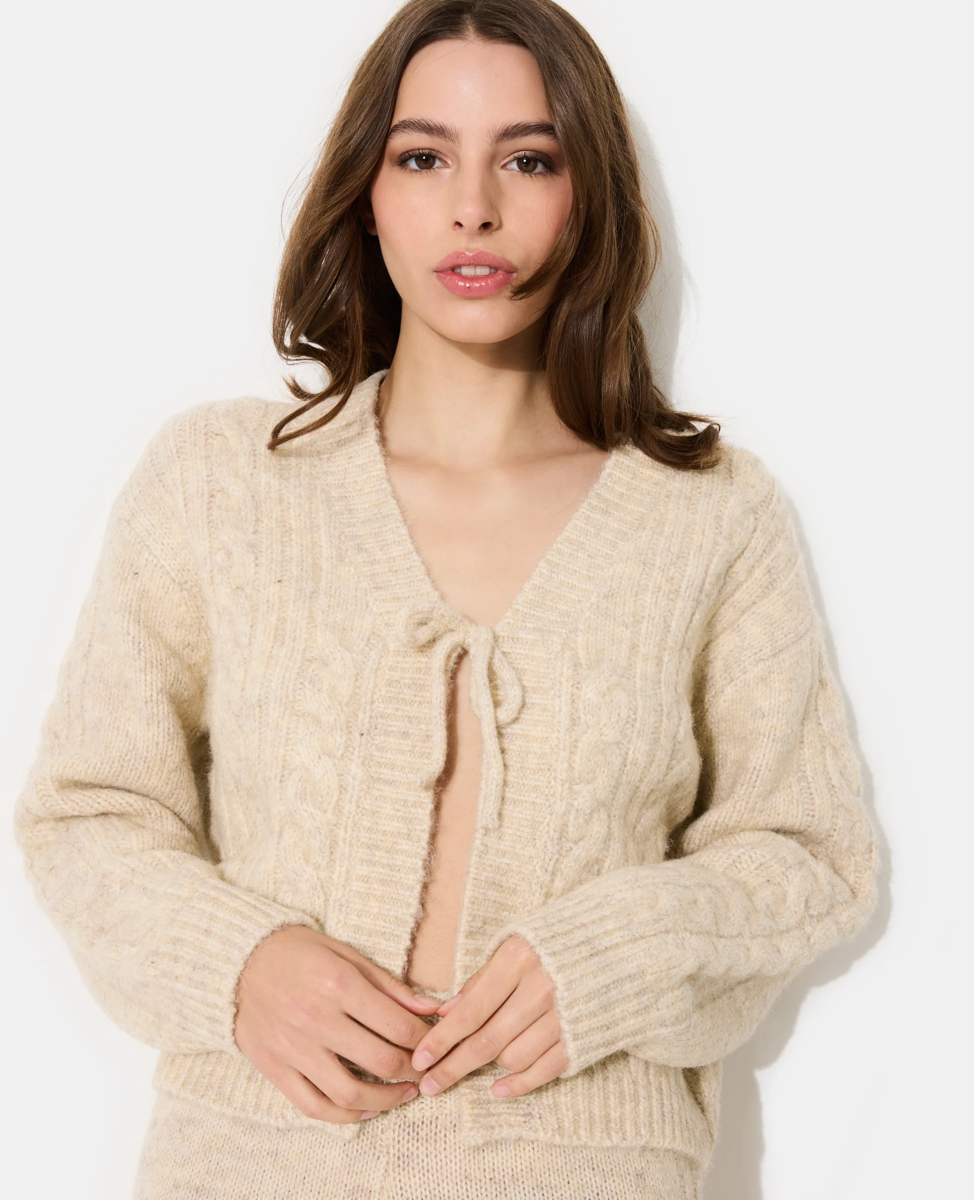 Gilet en maille torsadée avec nouette