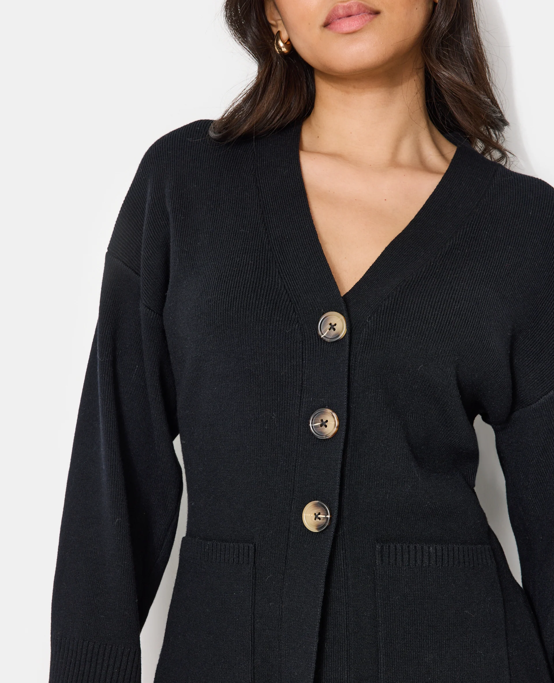 Gilet long et cintré avec poches