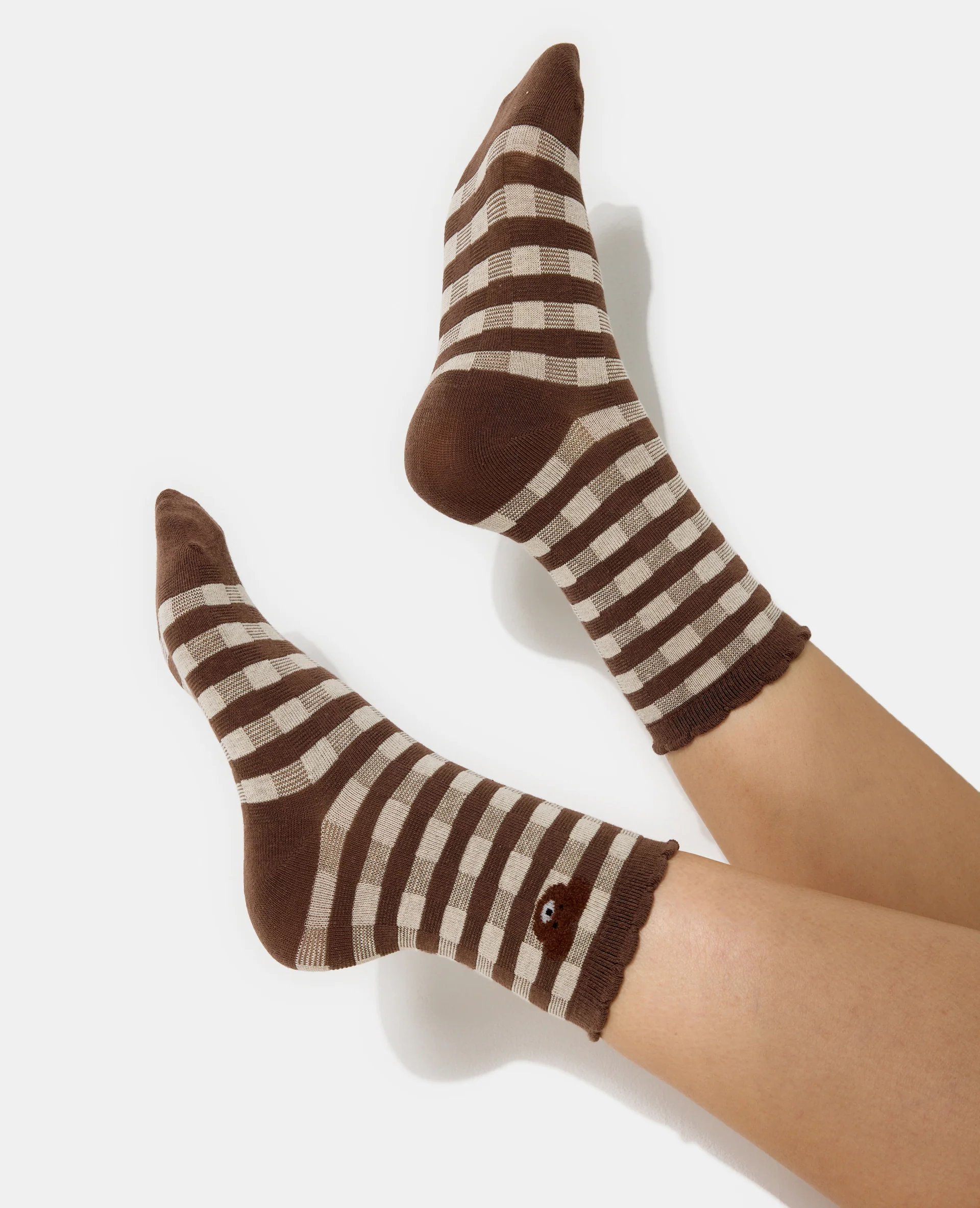 Paire de chaussettes à carreaux avec ourson