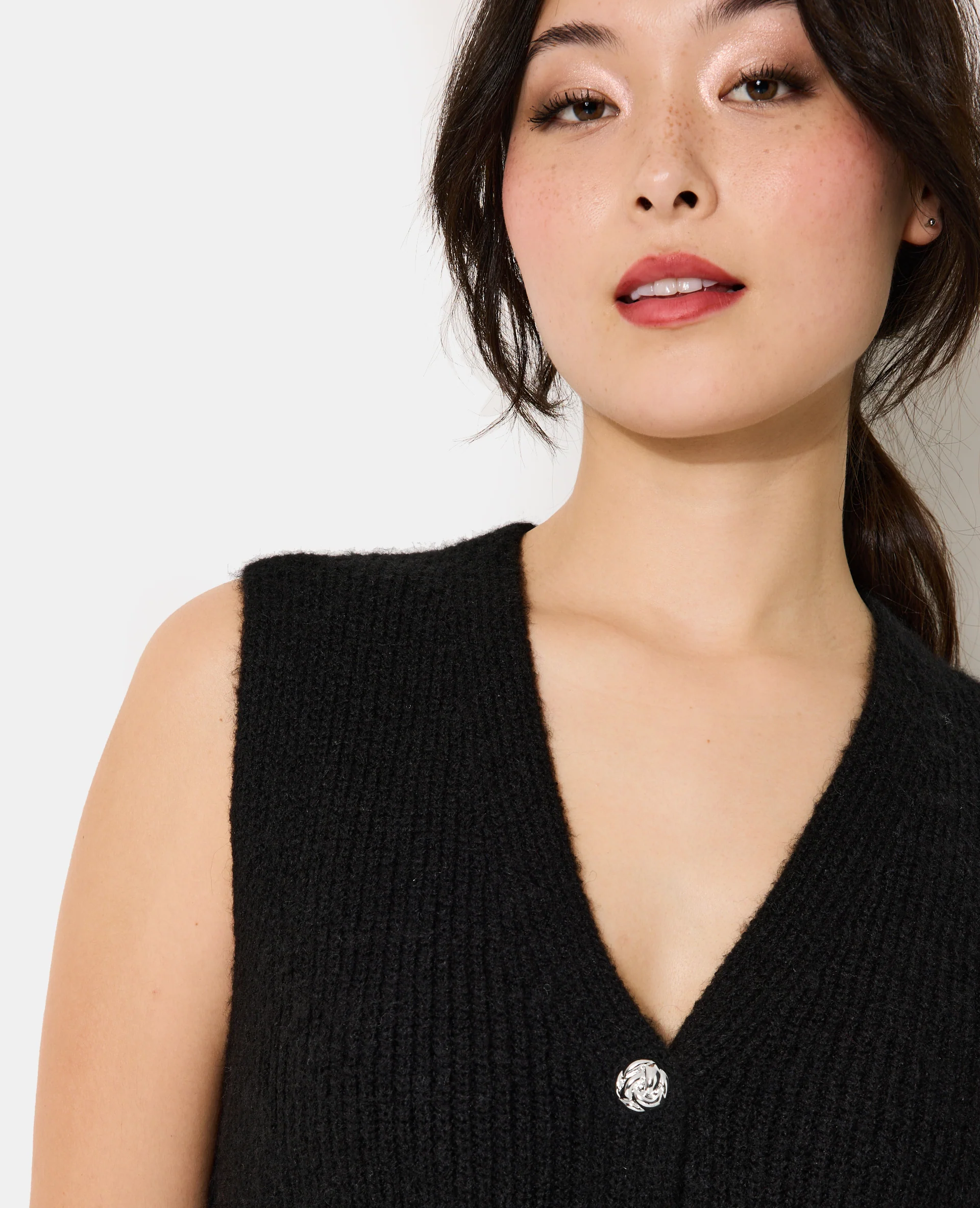 Gilet sans manches forme peplum