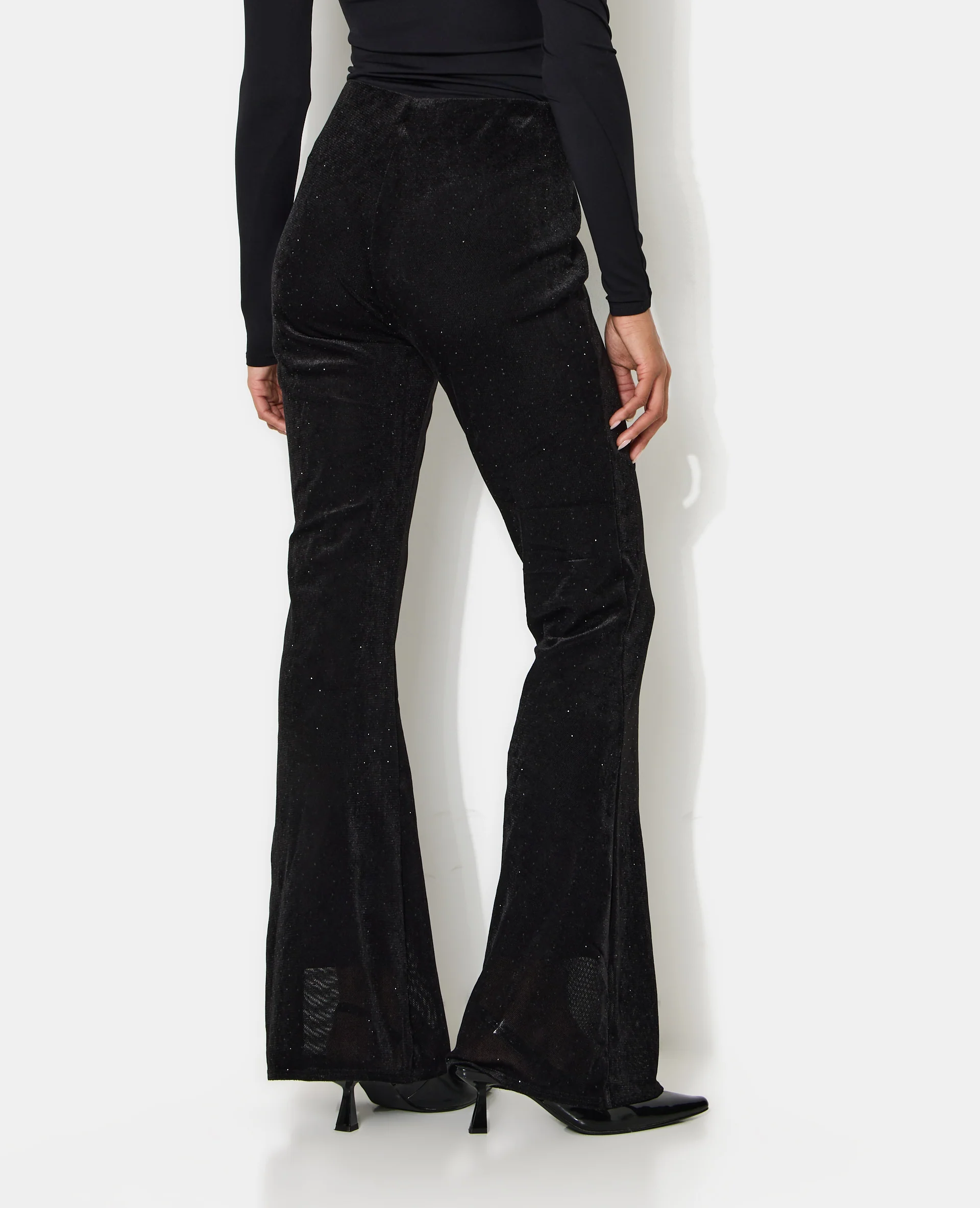 Pantalon flare en résille et velours avec strass