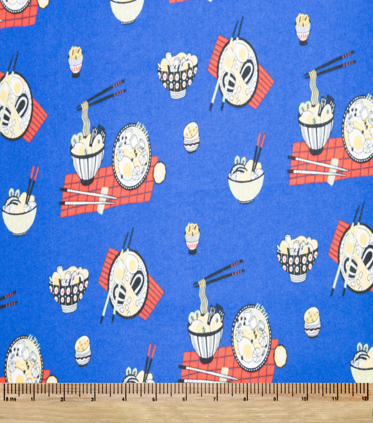 Super Snuggle Tossed Raman Flannel Fabric
