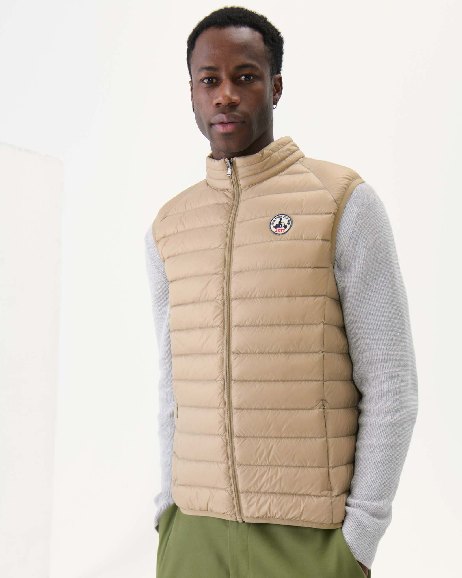 Beige Tom sleeveless padded jacket