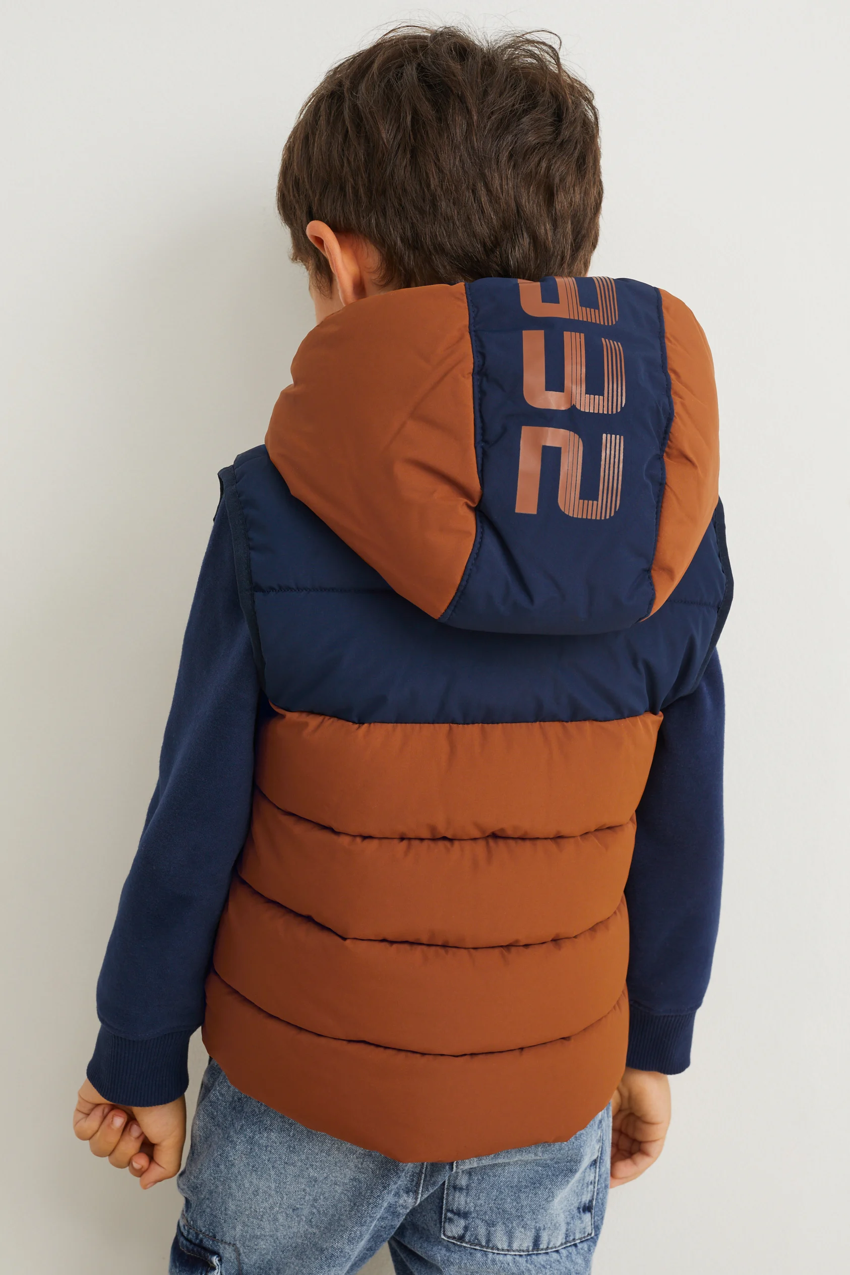 Quilted gilet with hood