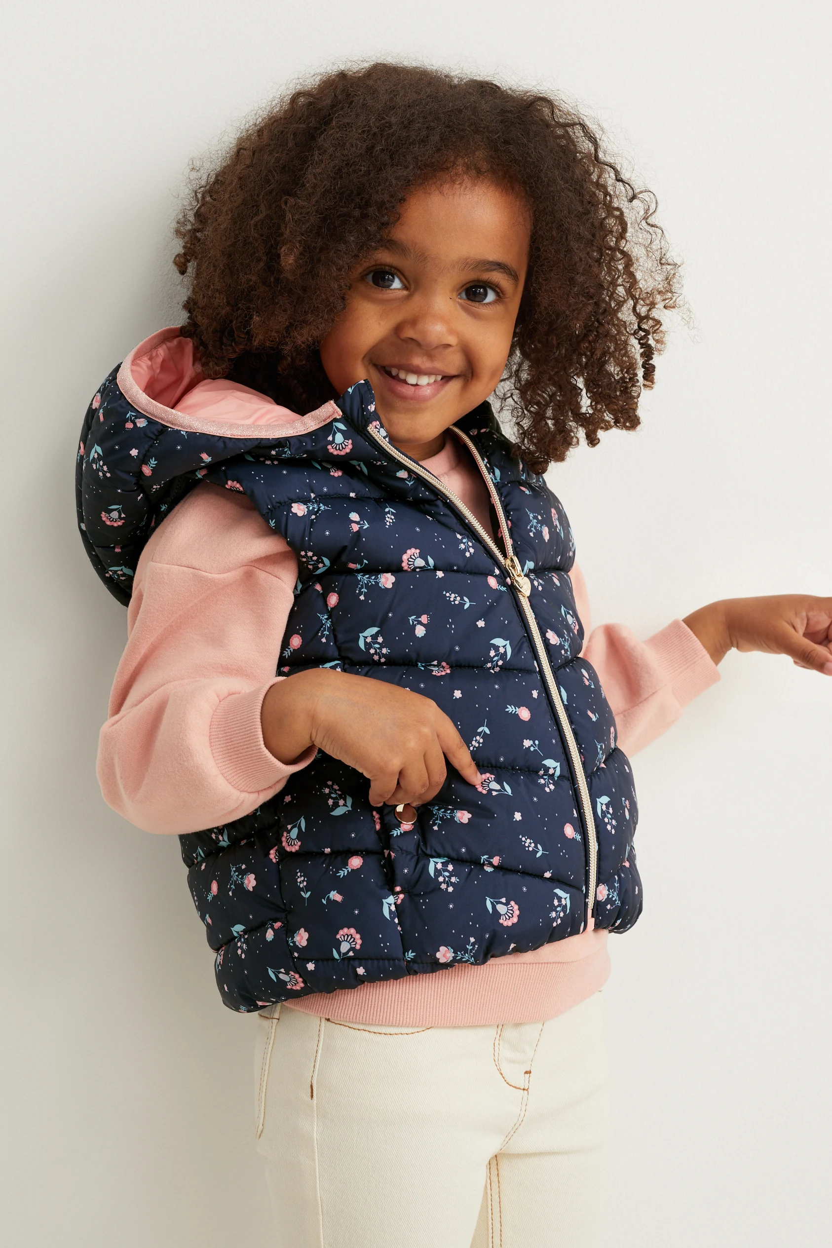 Quilted gilet with hood - floral