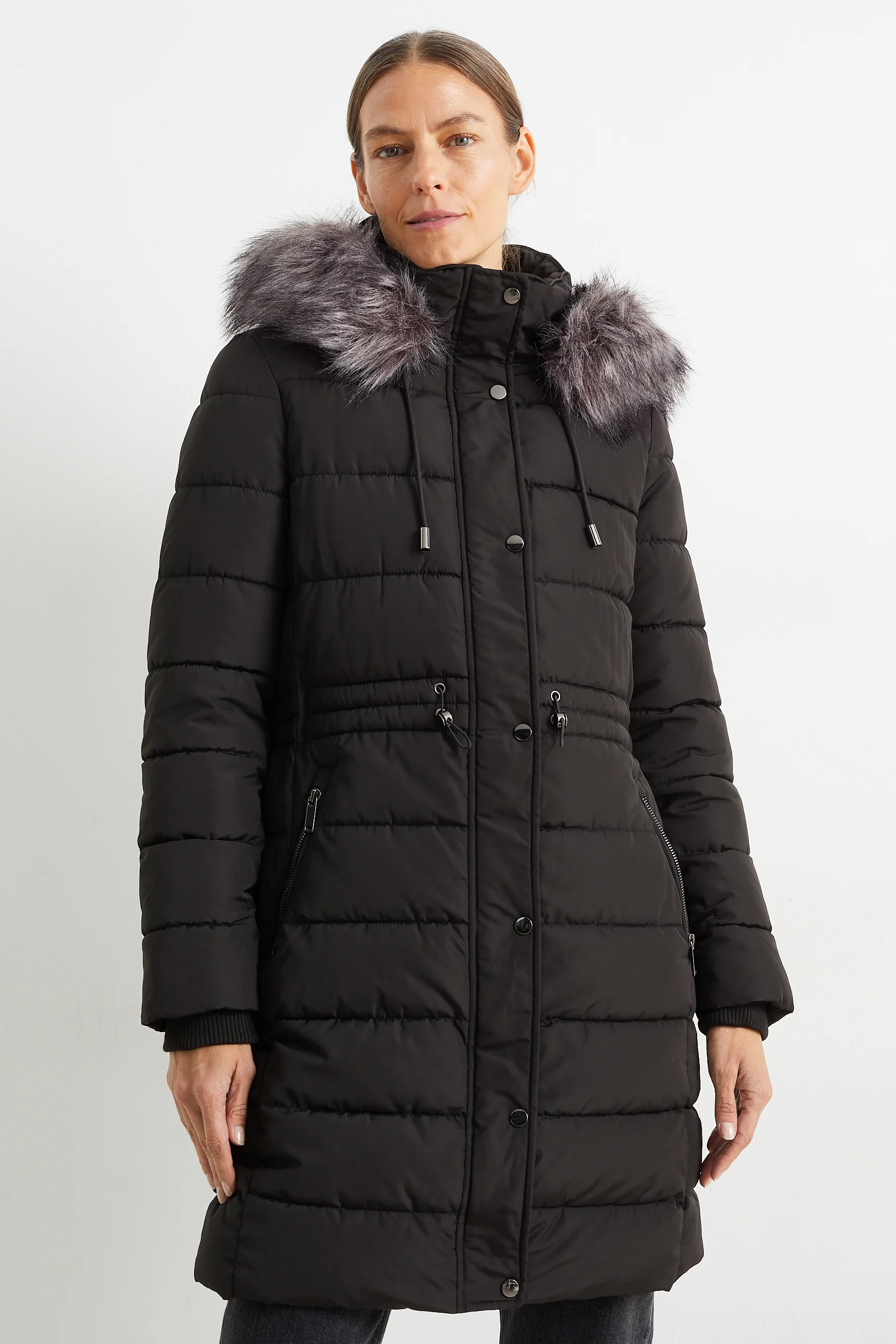 Quilted coat with hood and faux fur trim