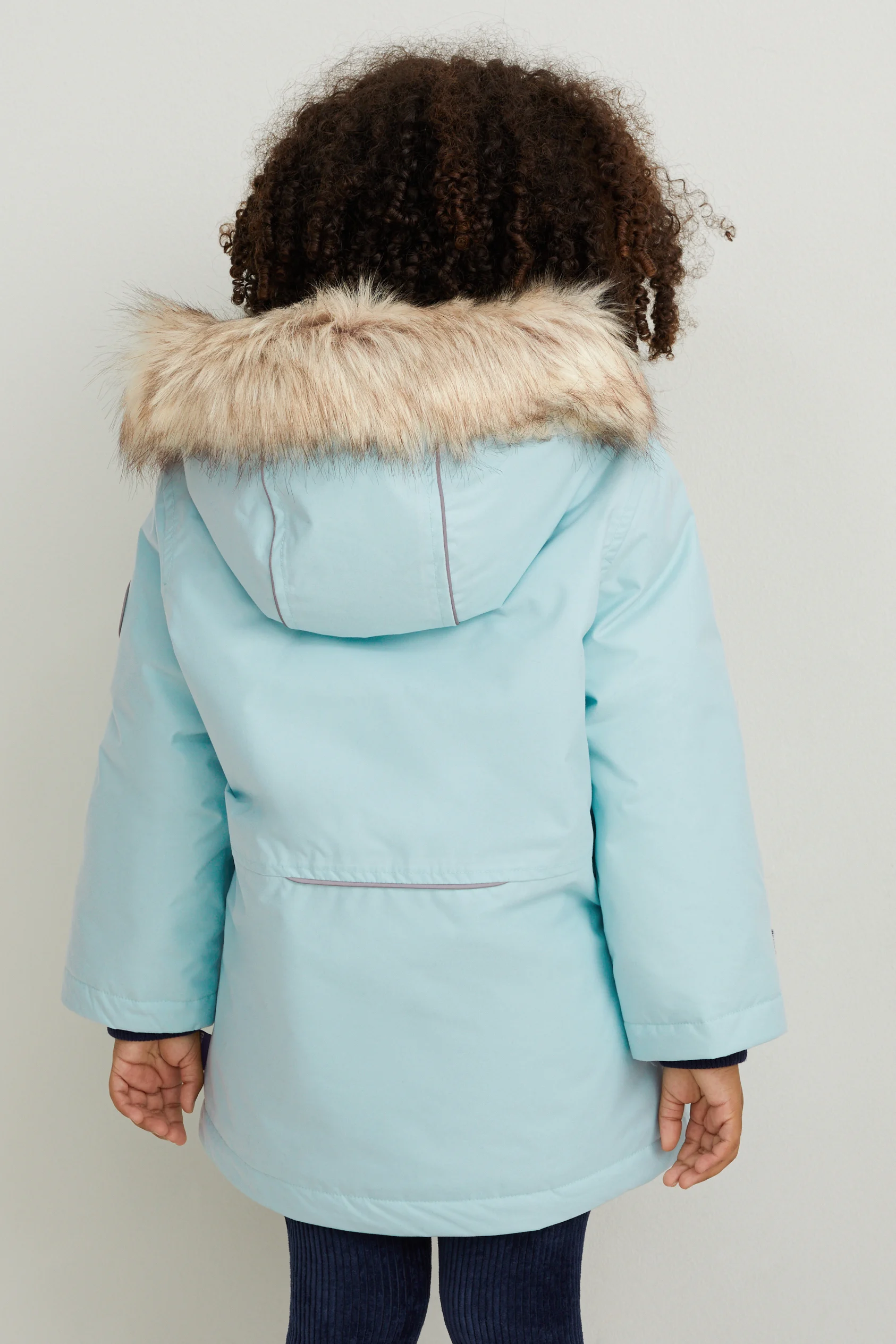 Rain jacket with hood and faux fur trim