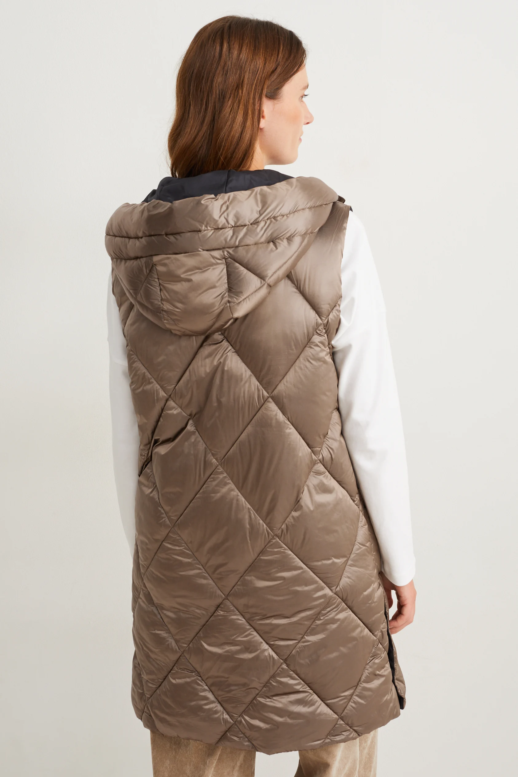 Long quilted gilet with hood