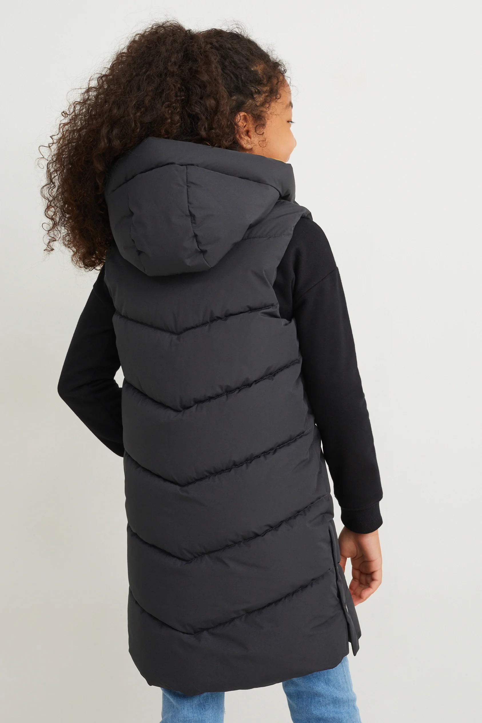 Long quilted gilet with hood