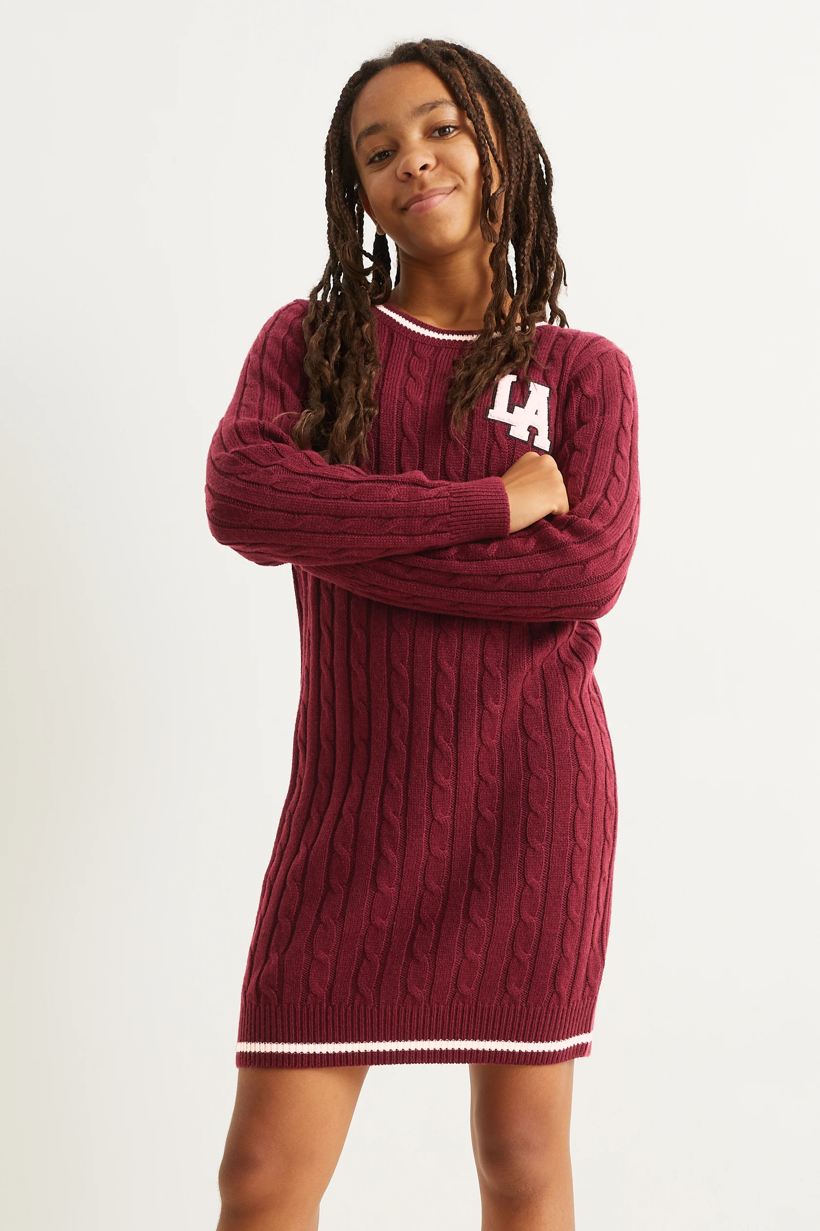 Knitted dress with cable knit pattern