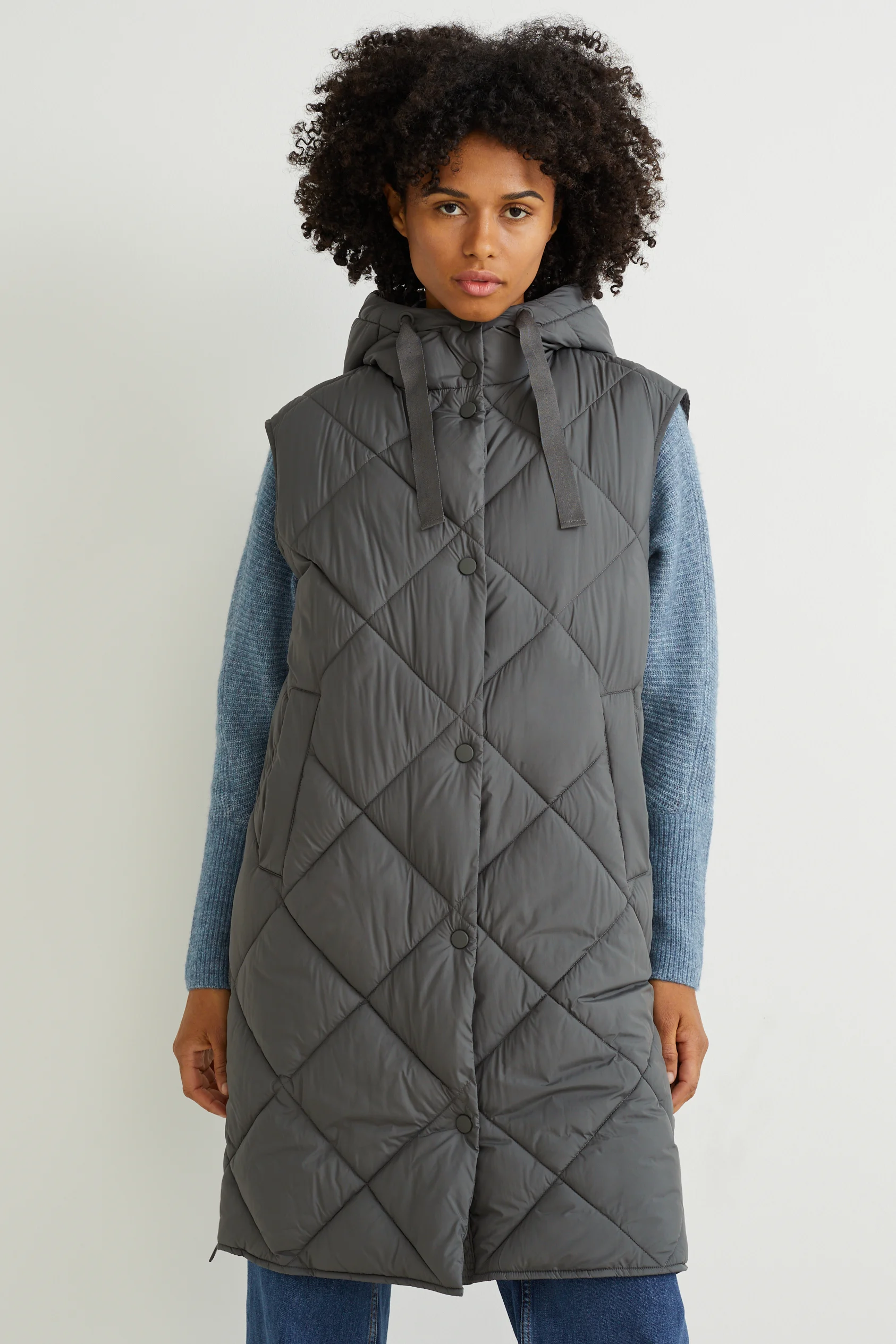 Long quilted gilet with hood