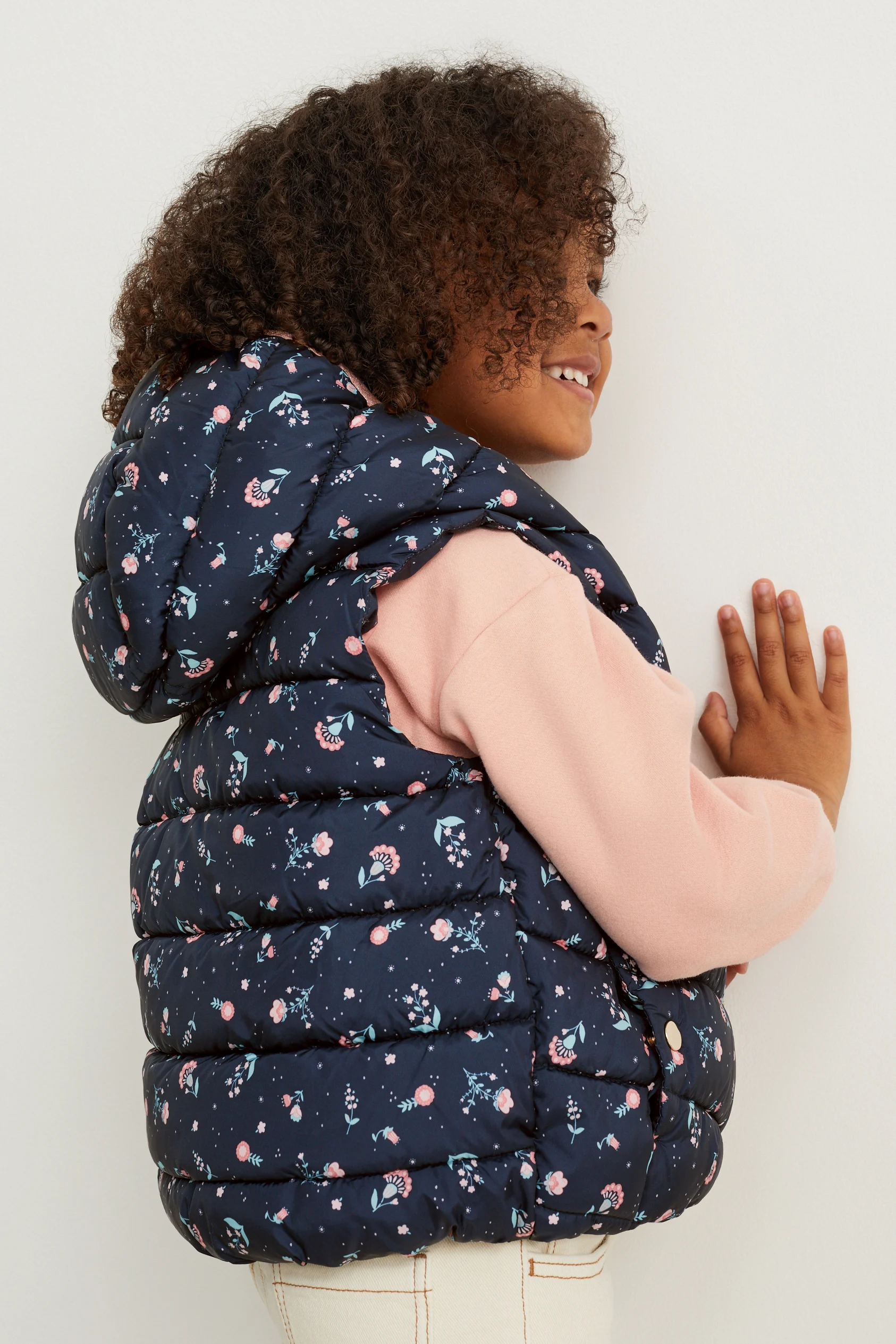 Quilted gilet with hood - floral