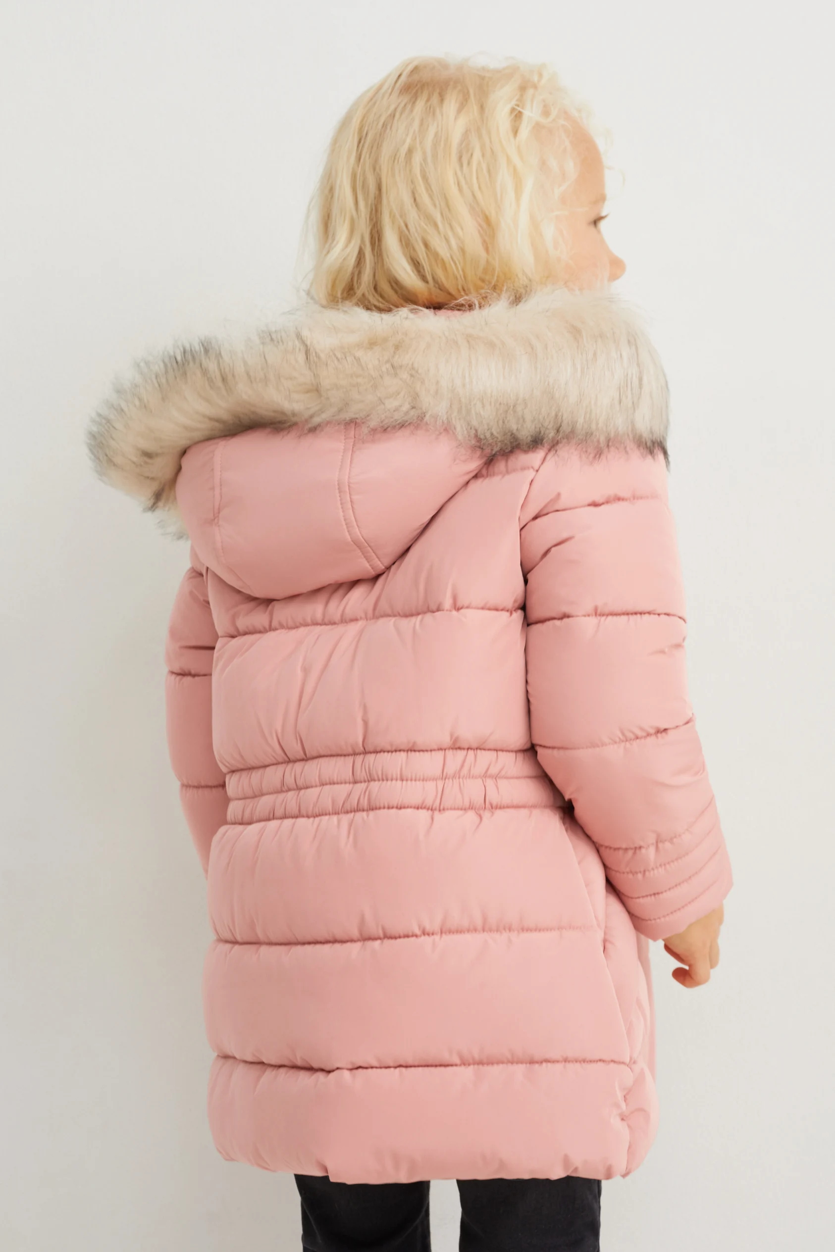 Quilted jacket with hood and faux fur trim