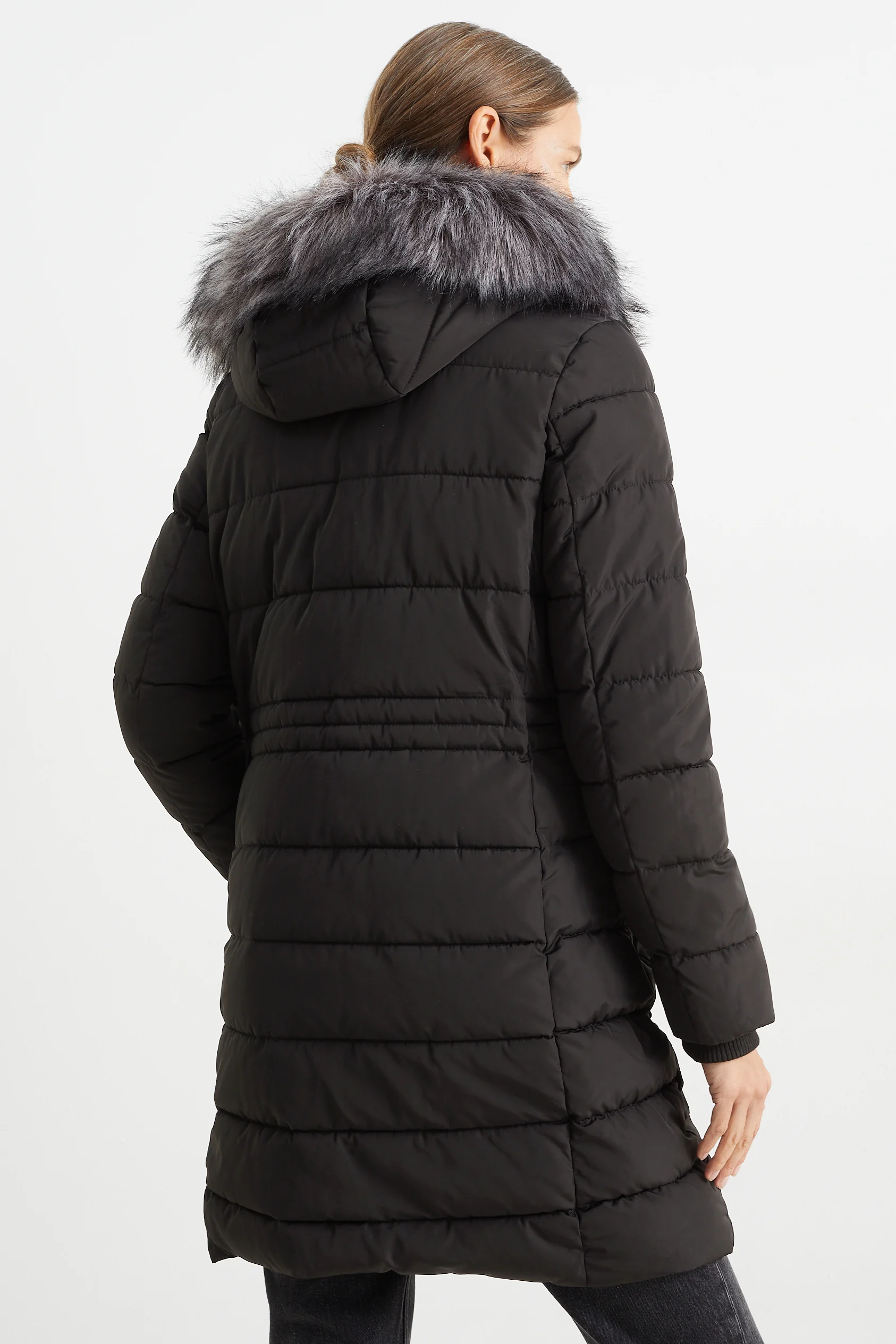 Quilted coat with hood and faux fur trim
