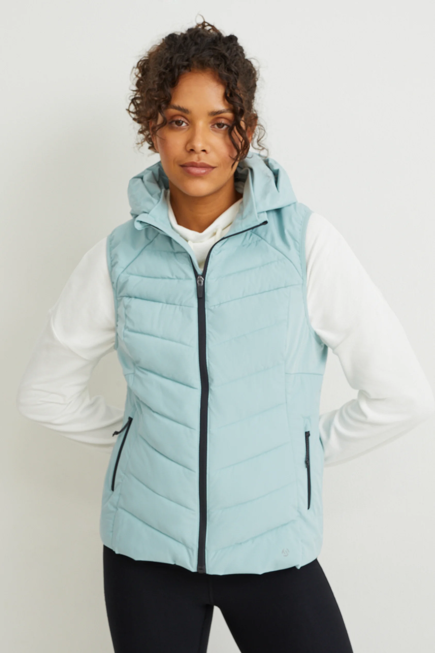 Quilted gilet with hood