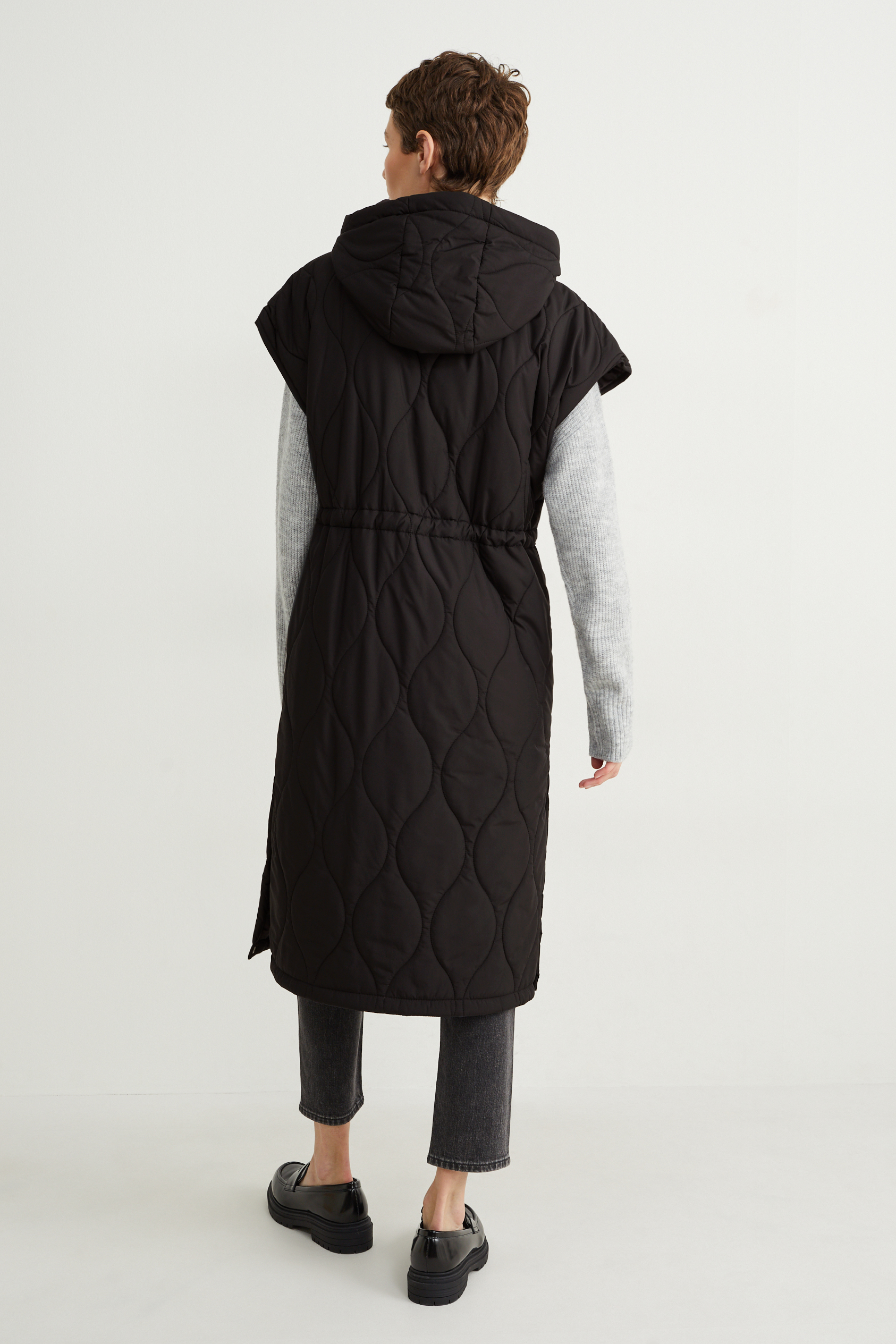 Long quilted gilet with hood