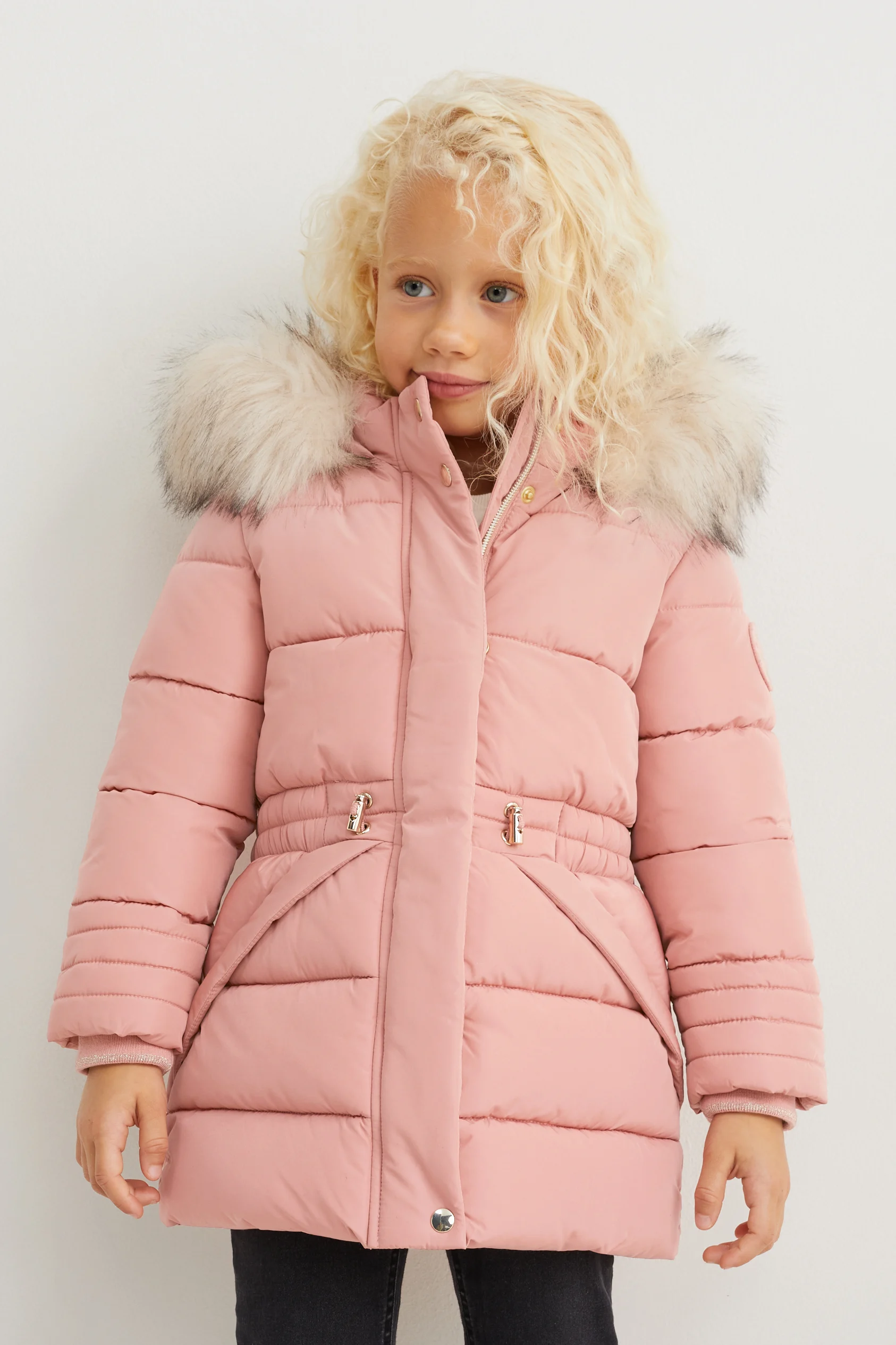 Quilted jacket with hood and faux fur trim