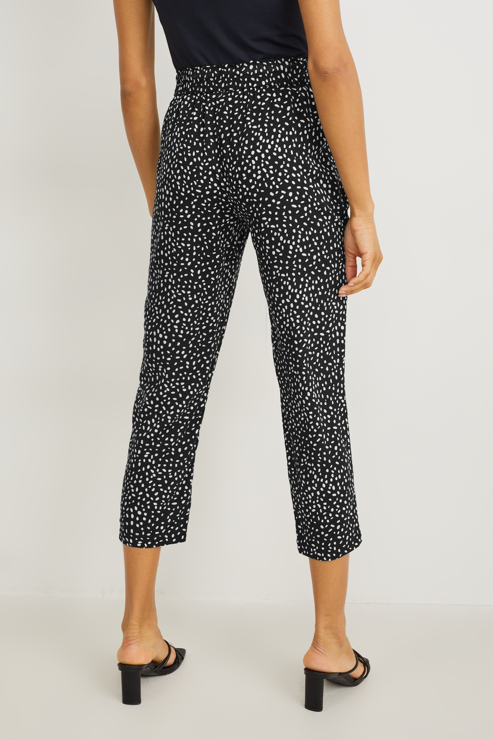 Cloth trousers - high-rise waist - tapered fit - patterned