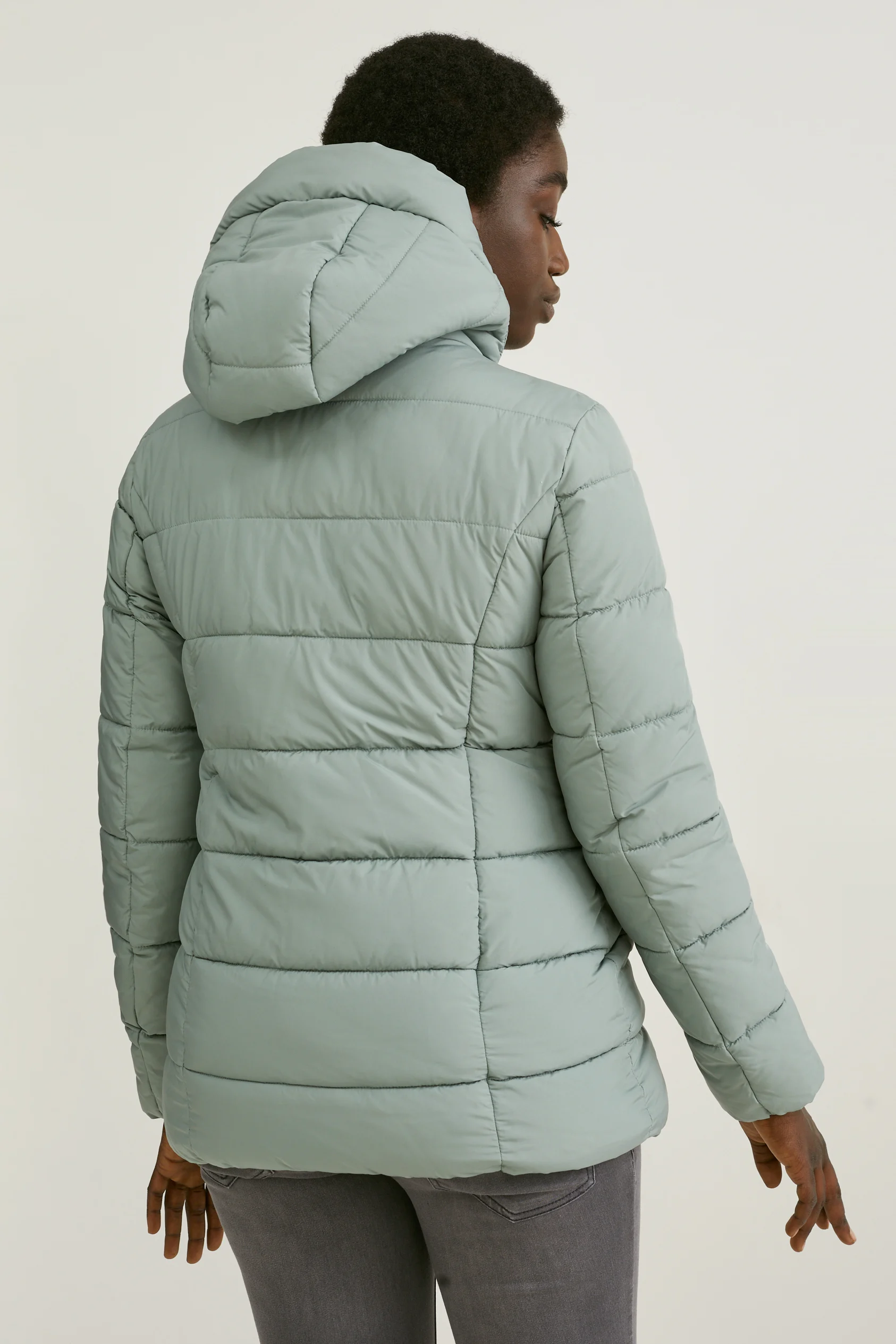 Maternity quilted jacket with hood and baby pouch