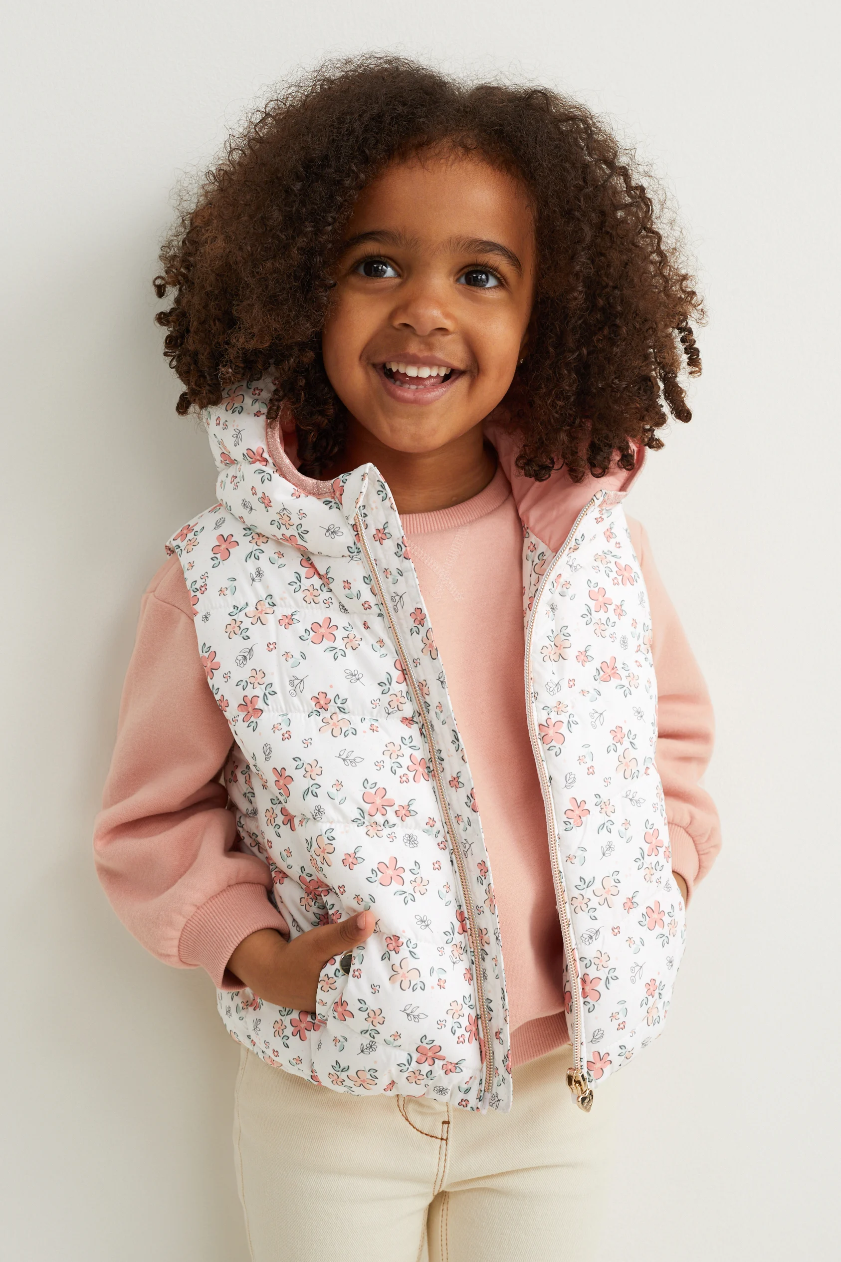 Quilted gilet with hood - floral