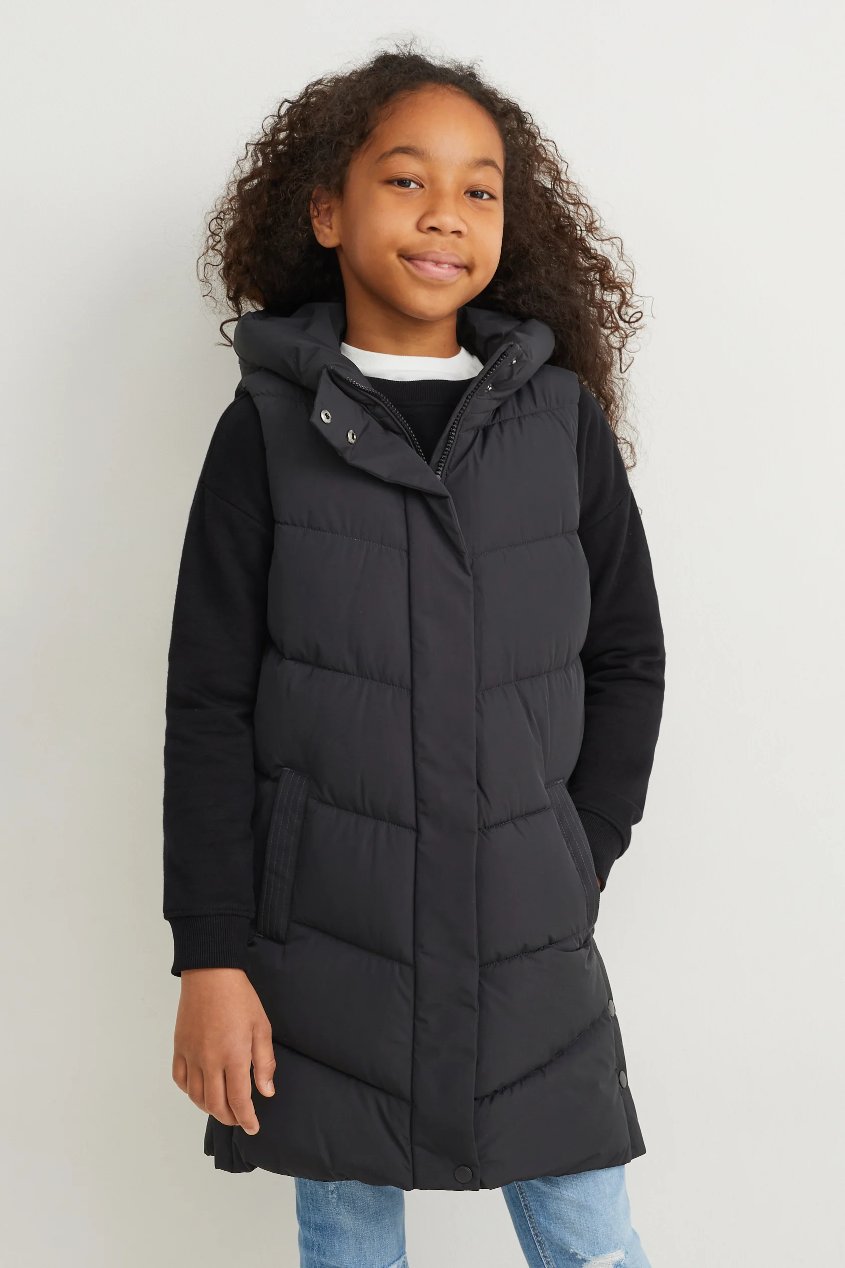 Long quilted gilet with hood