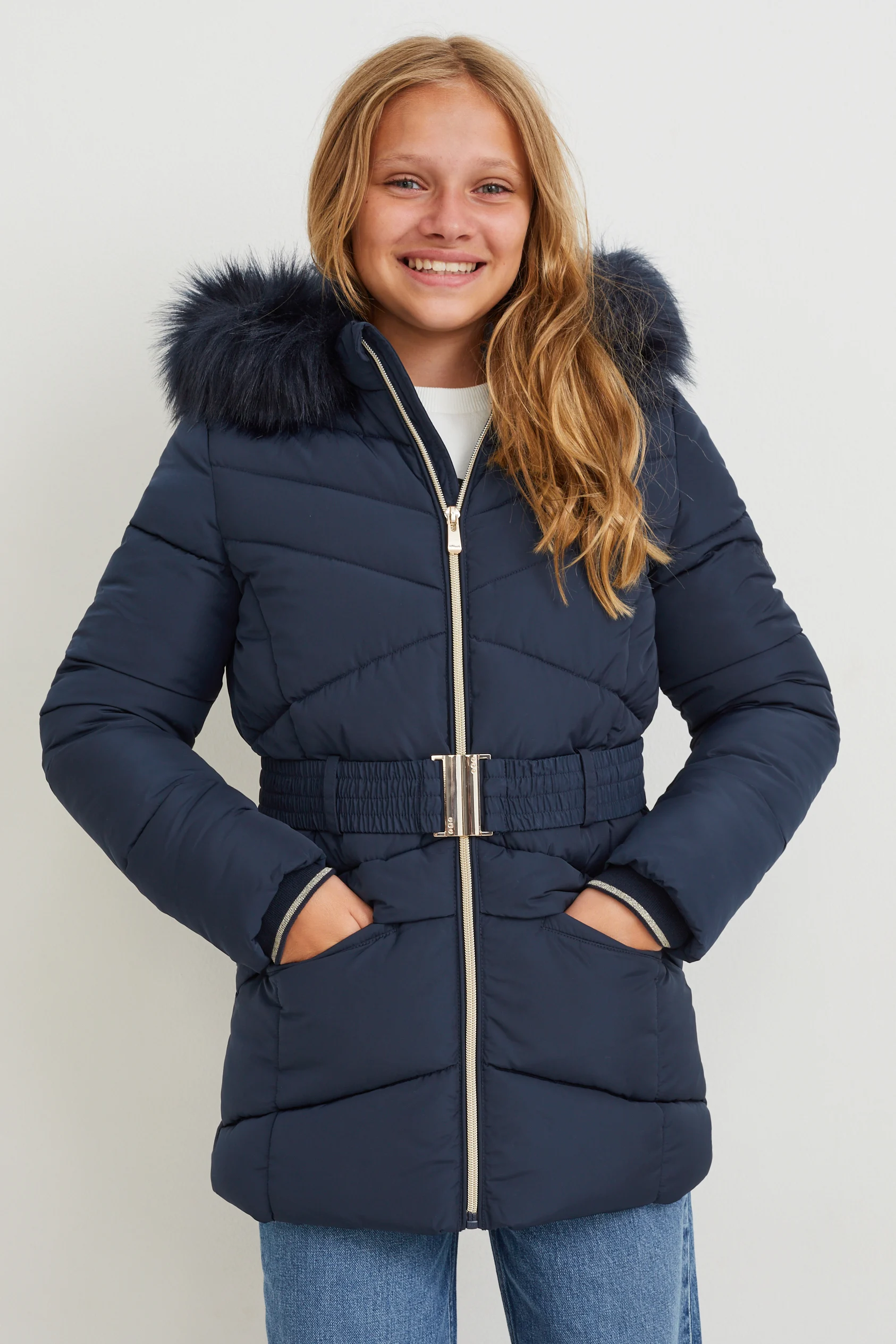 Quilted jacket with hood and faux fur trim