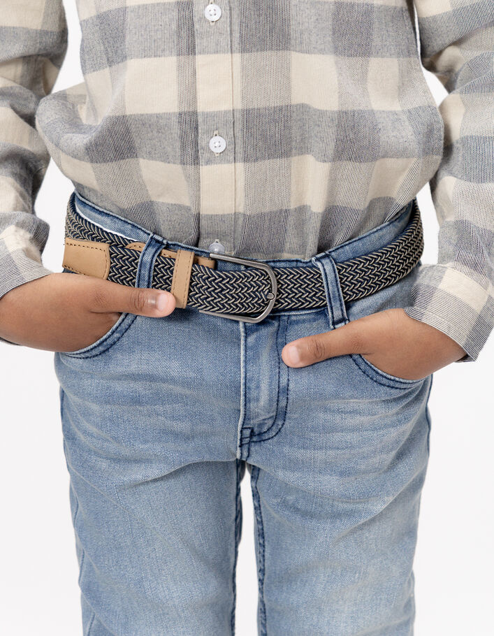 Jean slim bleu avec ceinture tress&eacute;e gar&ccedil;on