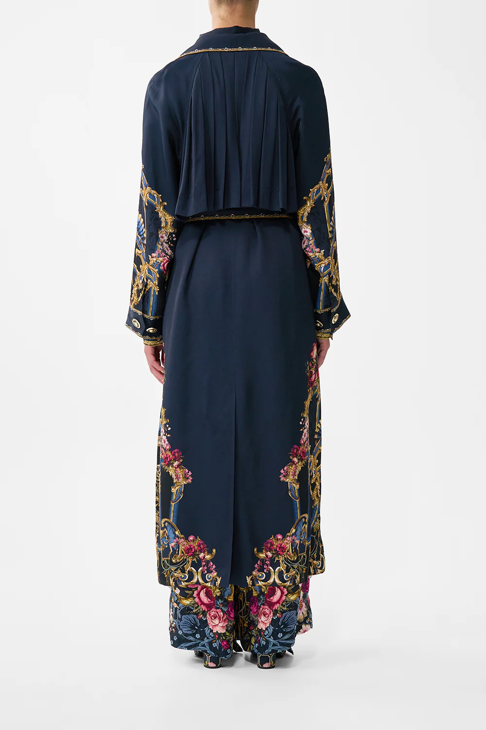 PLEATED BACK TRENCH ORNATE ON A PLATE