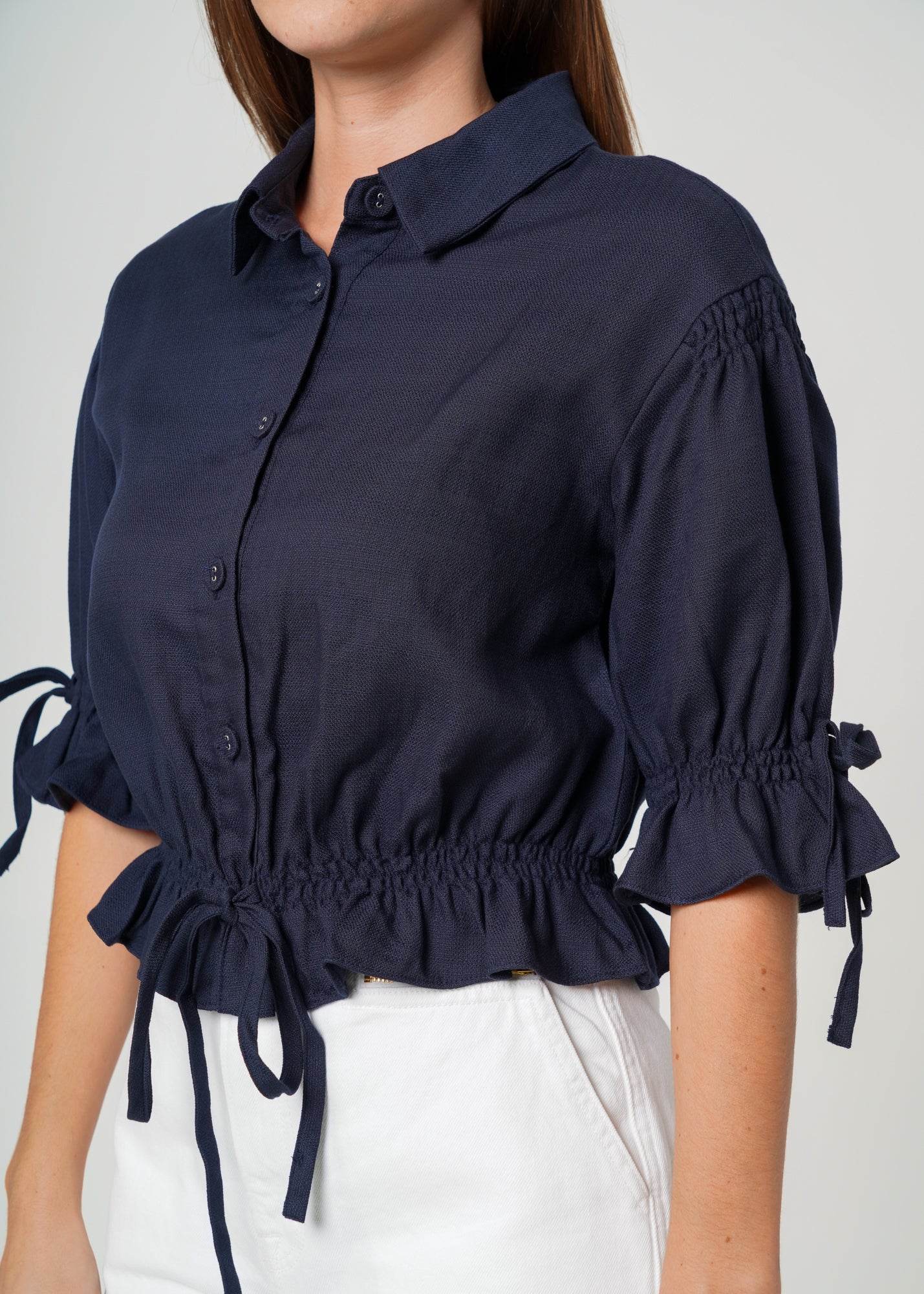 Nurode Button Front Tie Hem Blouse