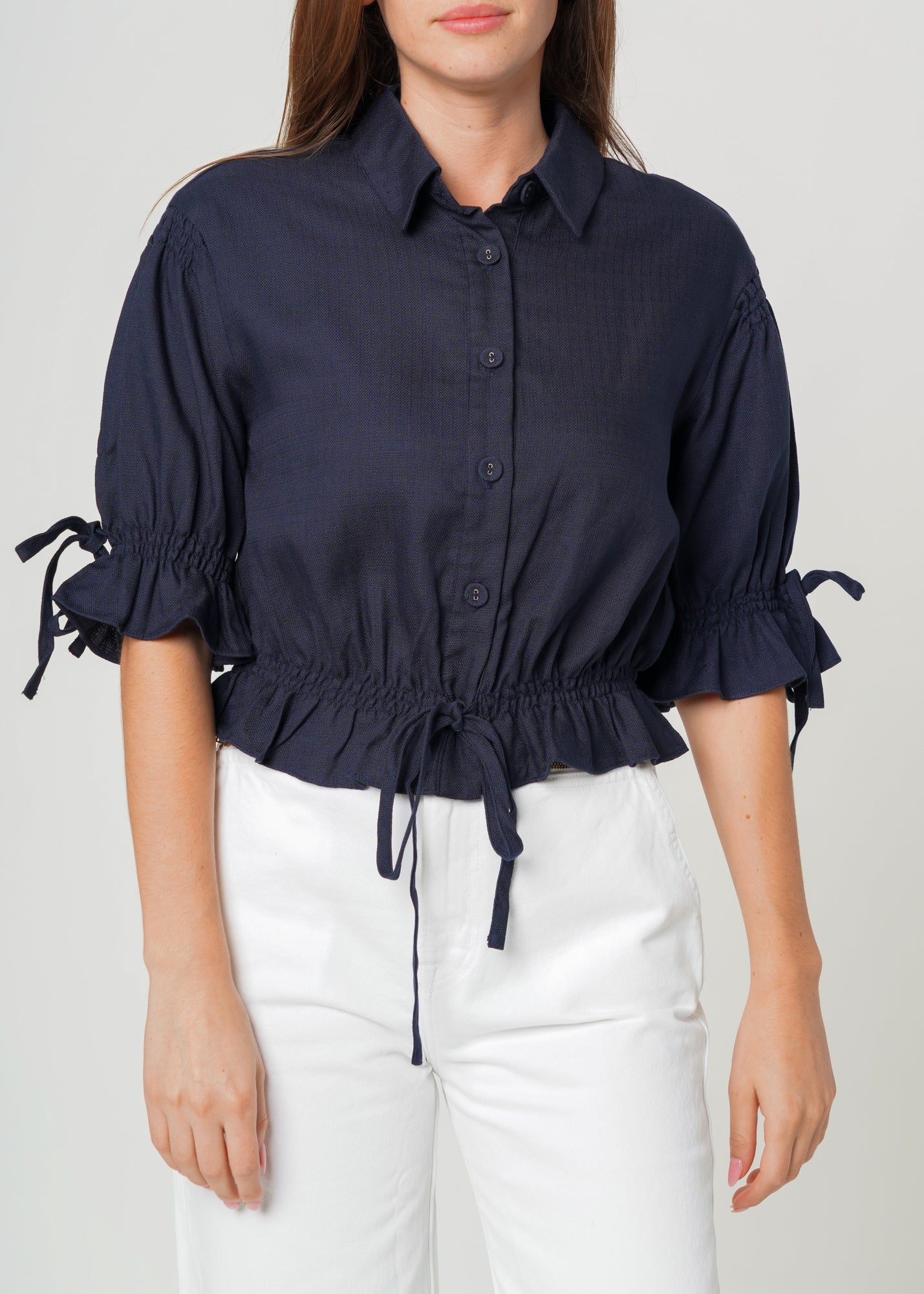 Nurode Button Front Tie Hem Blouse