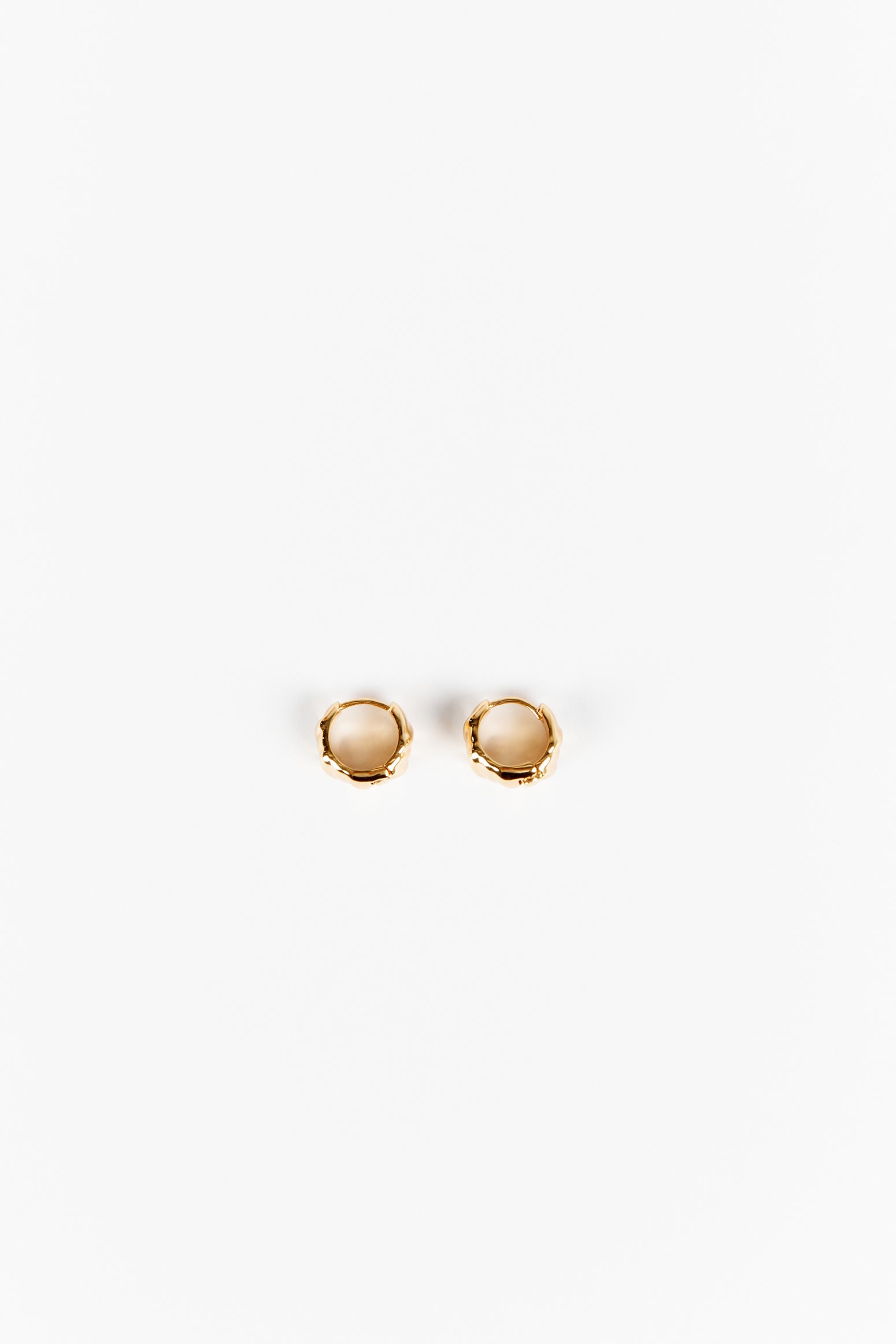 LUV AJ HAMMERED GOLD HUGGIE EARRINGS