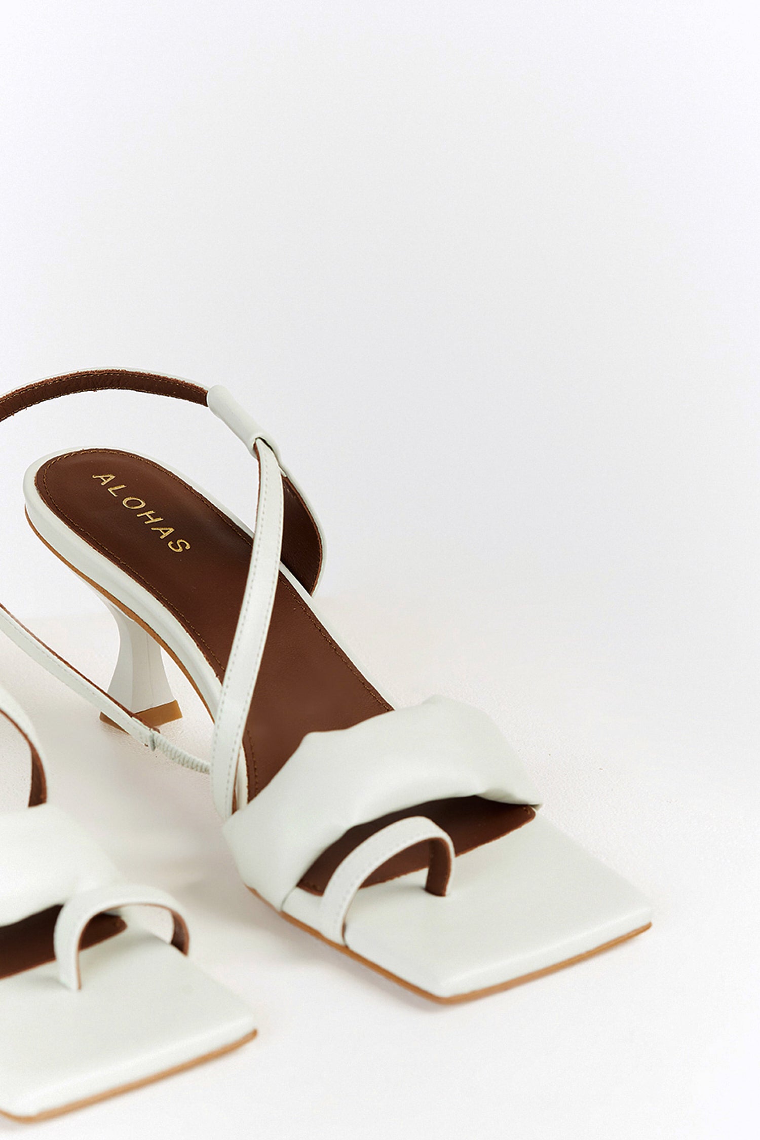 ALOHAS ASYMMETREIC WHITE HEEL