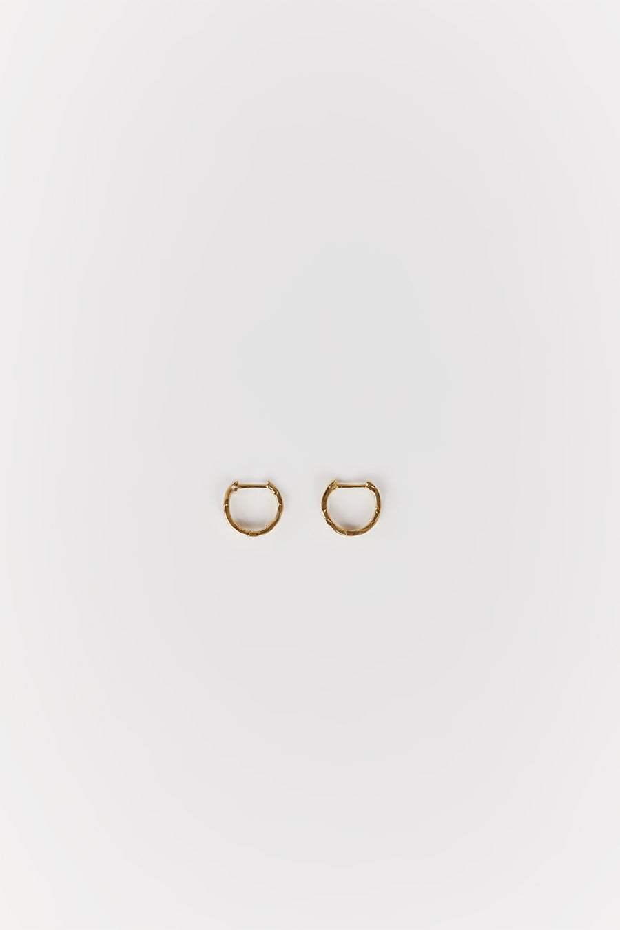 SAINT VALENTINE VERA WAVE GOLD HUGGIE EARRINGS