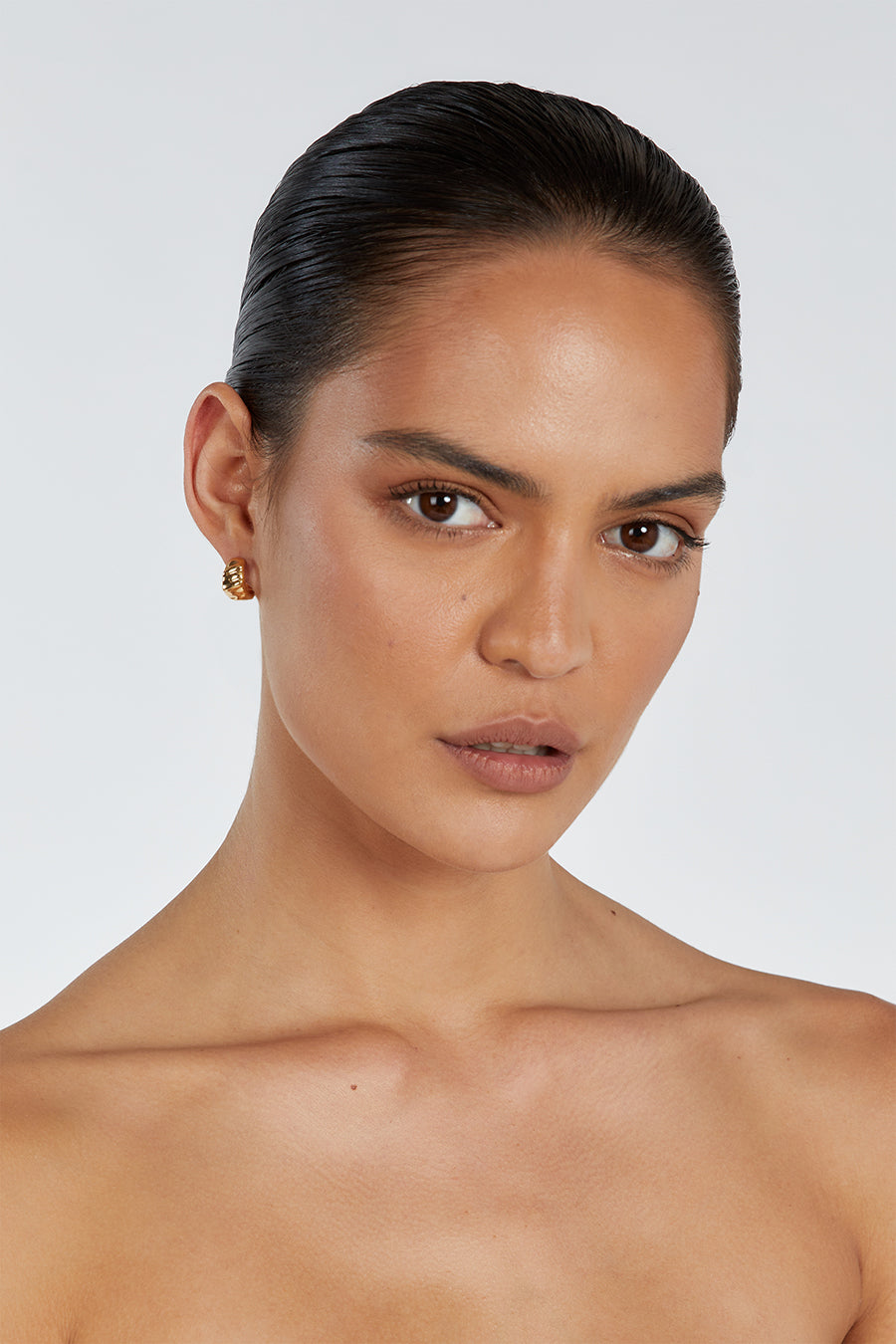 LUV AJ HAMMERED GOLD HUGGIE EARRINGS