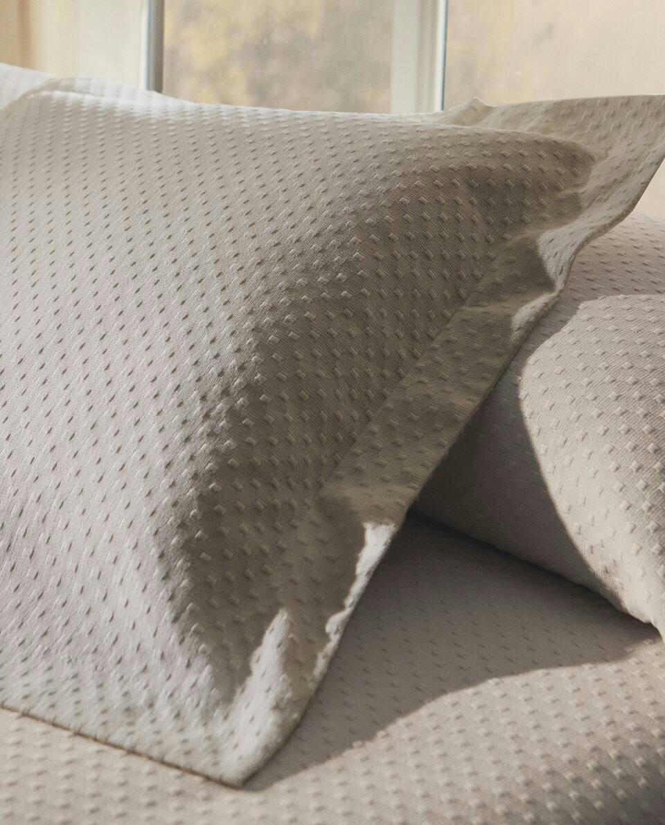 CUSHION COVER WITH POLKA DOT DESIGN